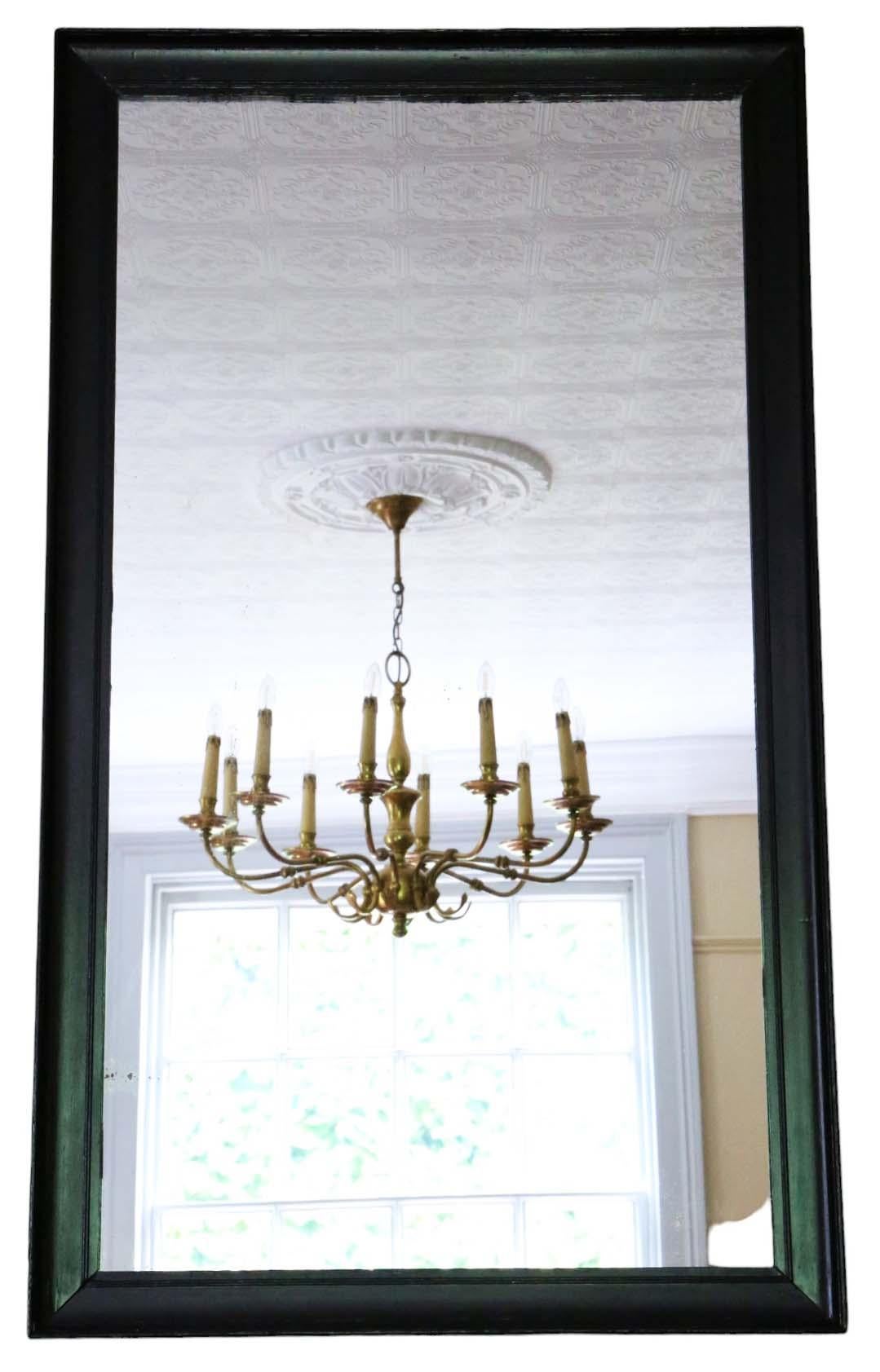Antique Large C1900 Ebonised Overmantle Wall Mirror – Quality Simple Design

The frame is solid with no loose joints, ensuring durability and no woodworm holes.

The mirrored glass is in good condition, showing light to medium oxidation, hazing  and