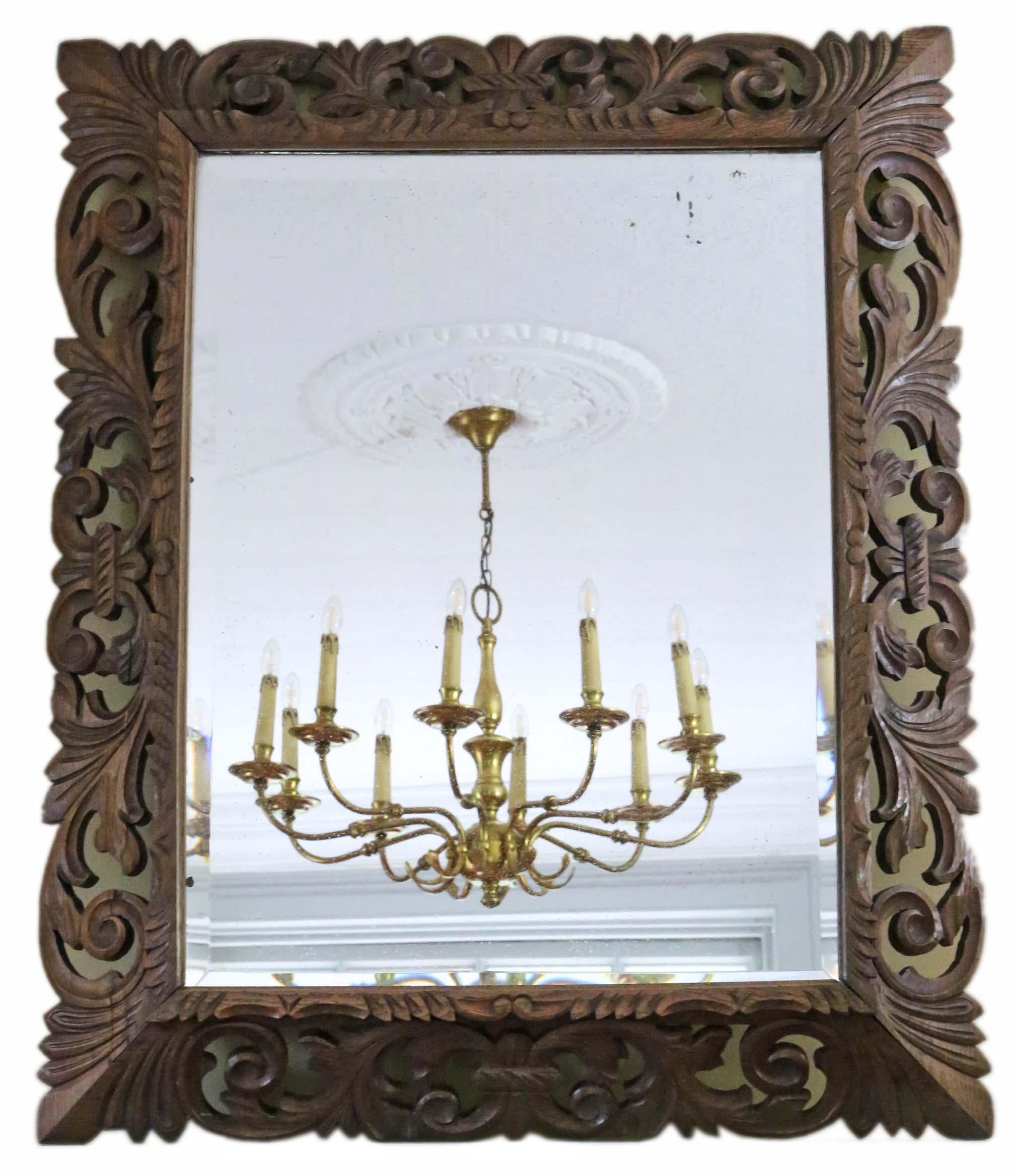 Antique large quality Florentine carved hardwood (padauk) wall or overmantle mirror C1900. Could be hung in portrait or landscape.

An impressive find, that would look amazing in the right location. No loose joints or woodworm.

Original bevel