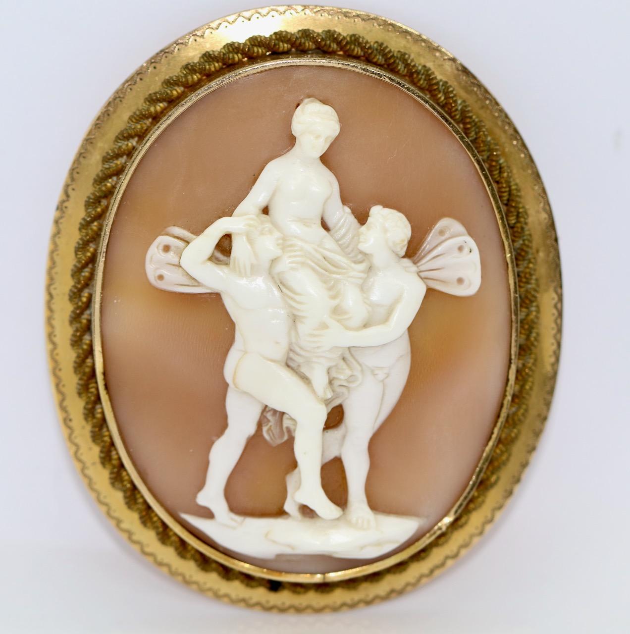 Beautiful Antique, Large Cameo Brooch.

Romantic scene. Possibly gilded.
Very fine and detailed carving.
Cameo is signed on the back.