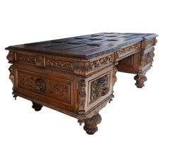 Antique Large Carved Oak Baronial Glass Top Desk and Gilt Embossed Leather Chair