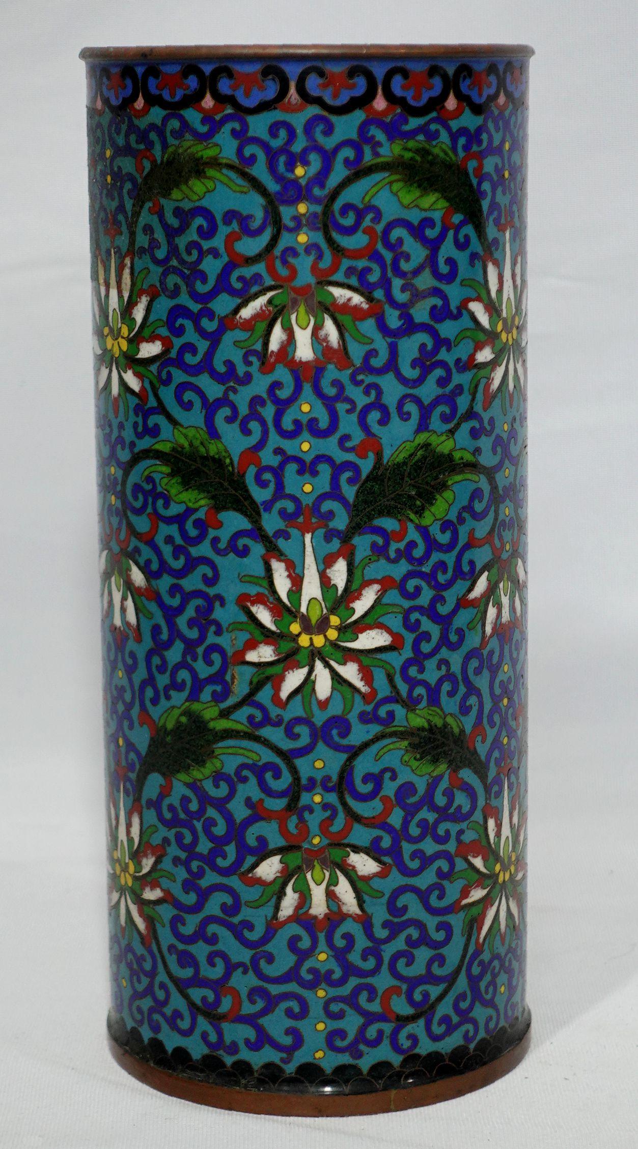 Quality work, a large Chinese Cloisonné Hat Vase depicting floral patterns all around the entire vase with vivid colors of yellow, green, red, blue, brown, red, and cyan base. Qianlong mark on the base.
