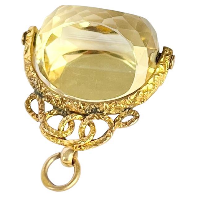 Grand bouton pivotant ancien en or 9 carats et citrine