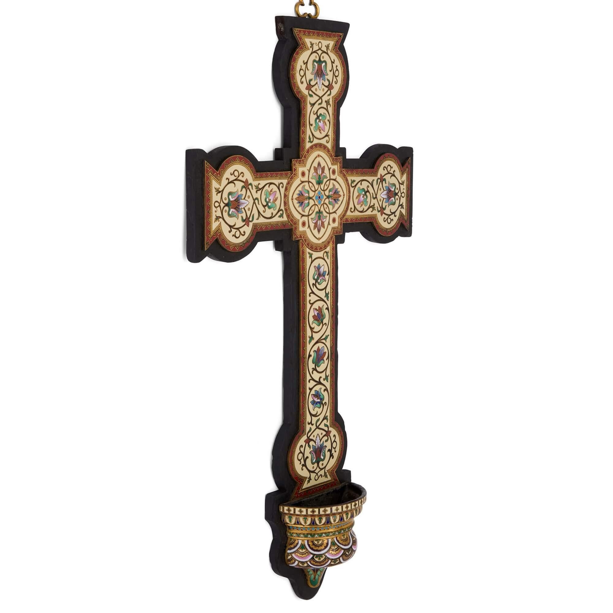 Antique large cloisonné enamel wall crucifix with font 
French, Late 19th Century 
Height 57cm, width 33cm, depth 7cm

This superb decorative cross is designed to hang on a wall, enabled by the small clover-shaped gilt metal handle which surmounts