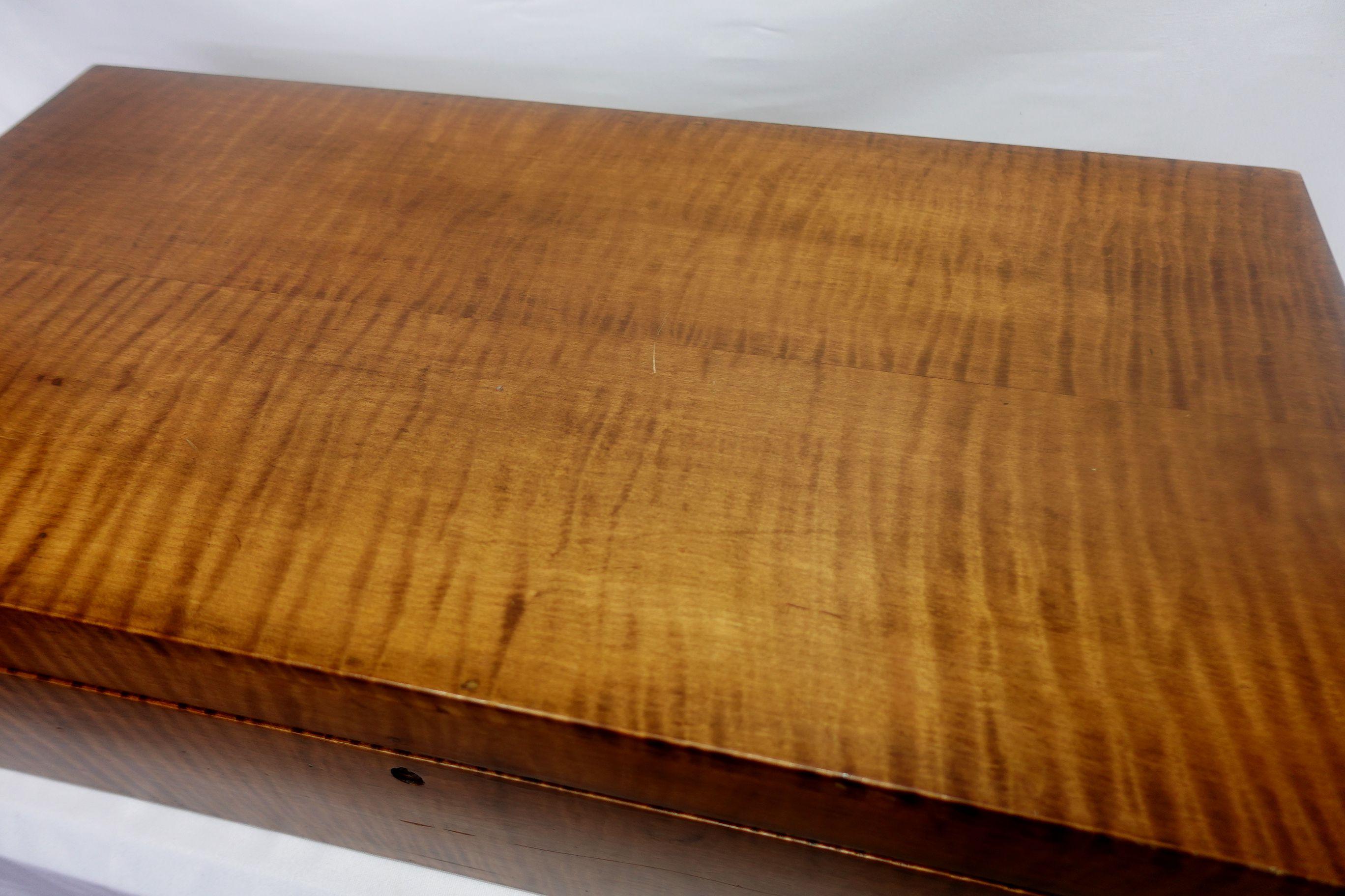Large late 19th-century to early 20th century Country Style Lift-top Maple Box with the charming pattern of Tiger Skin, no key included.
Measures: ht. 8 1/2, wd. 30, dp. 15 1/2 in.
 