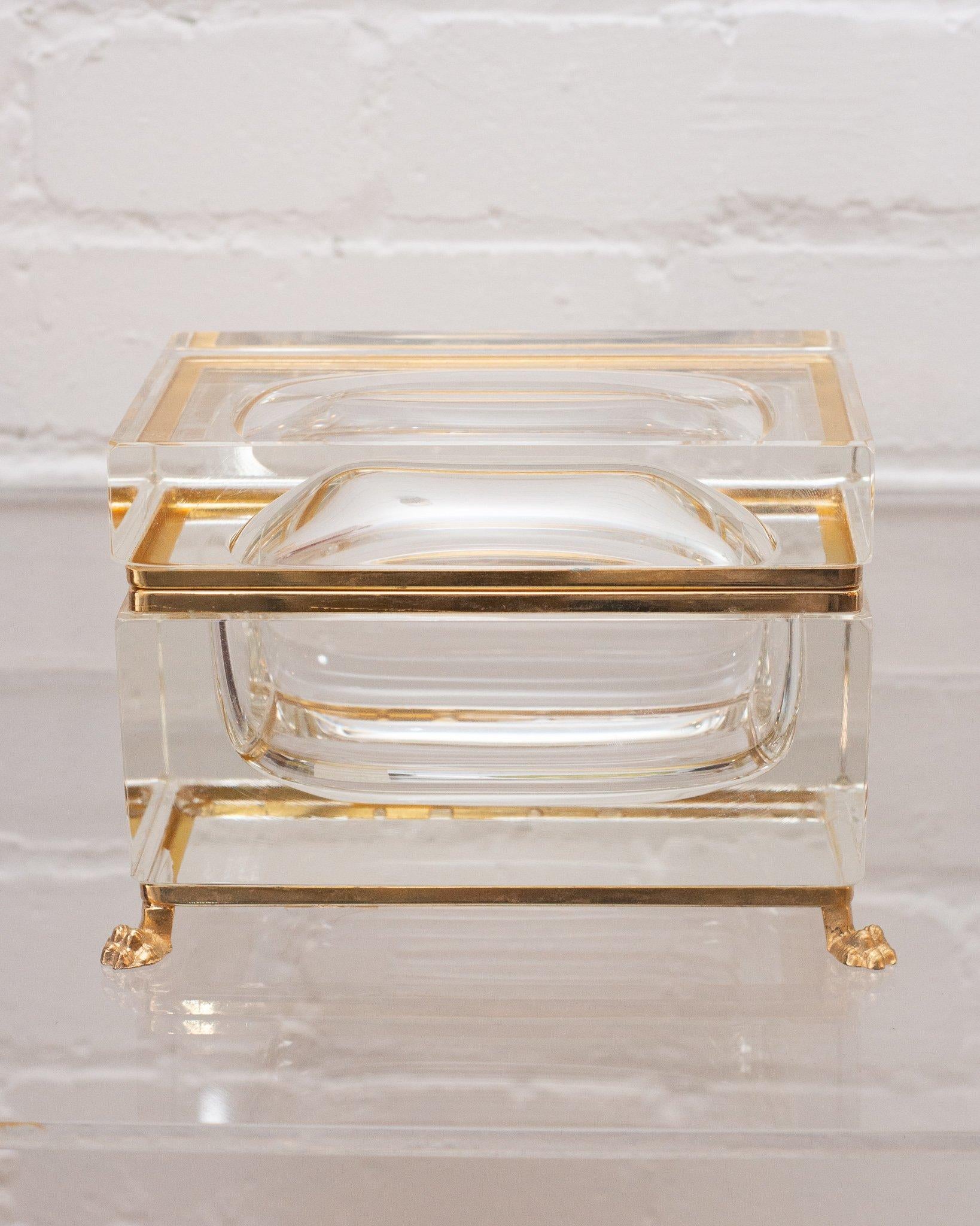 This antique large crystal and bronze box makes a statement in any space. A very contemporary design for the early 1900s production, this piece transitions from modern to Classic interiors seamlessly with its sophisticated lines.