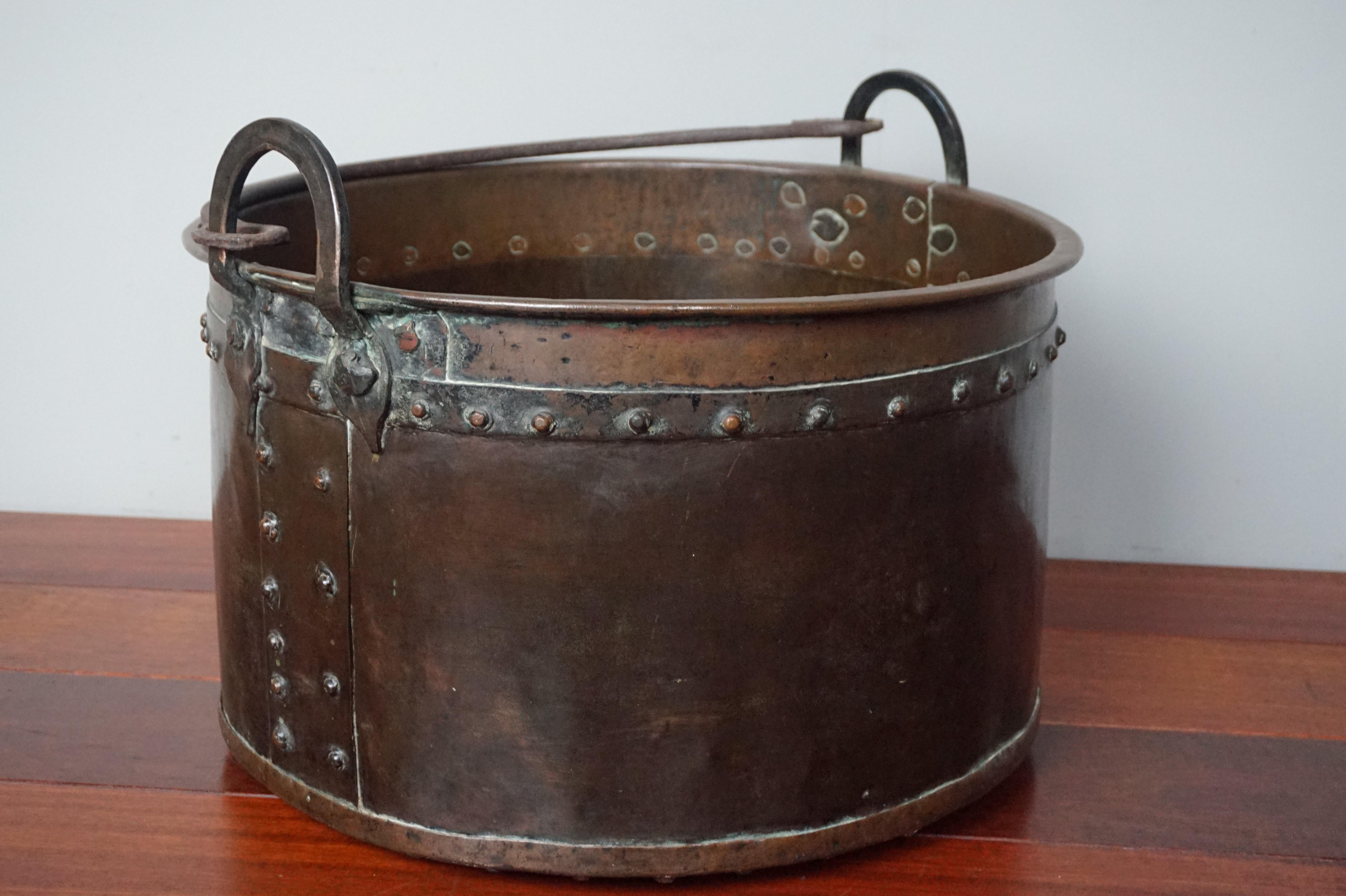 Extra large, all handcrafted and great looking copper firewood bucket.

Only if you were a very wealthy person in Holland in the early 1800s, would you be able to afford this large, impressive and all-handcrafted bucket. This stunning and tactile