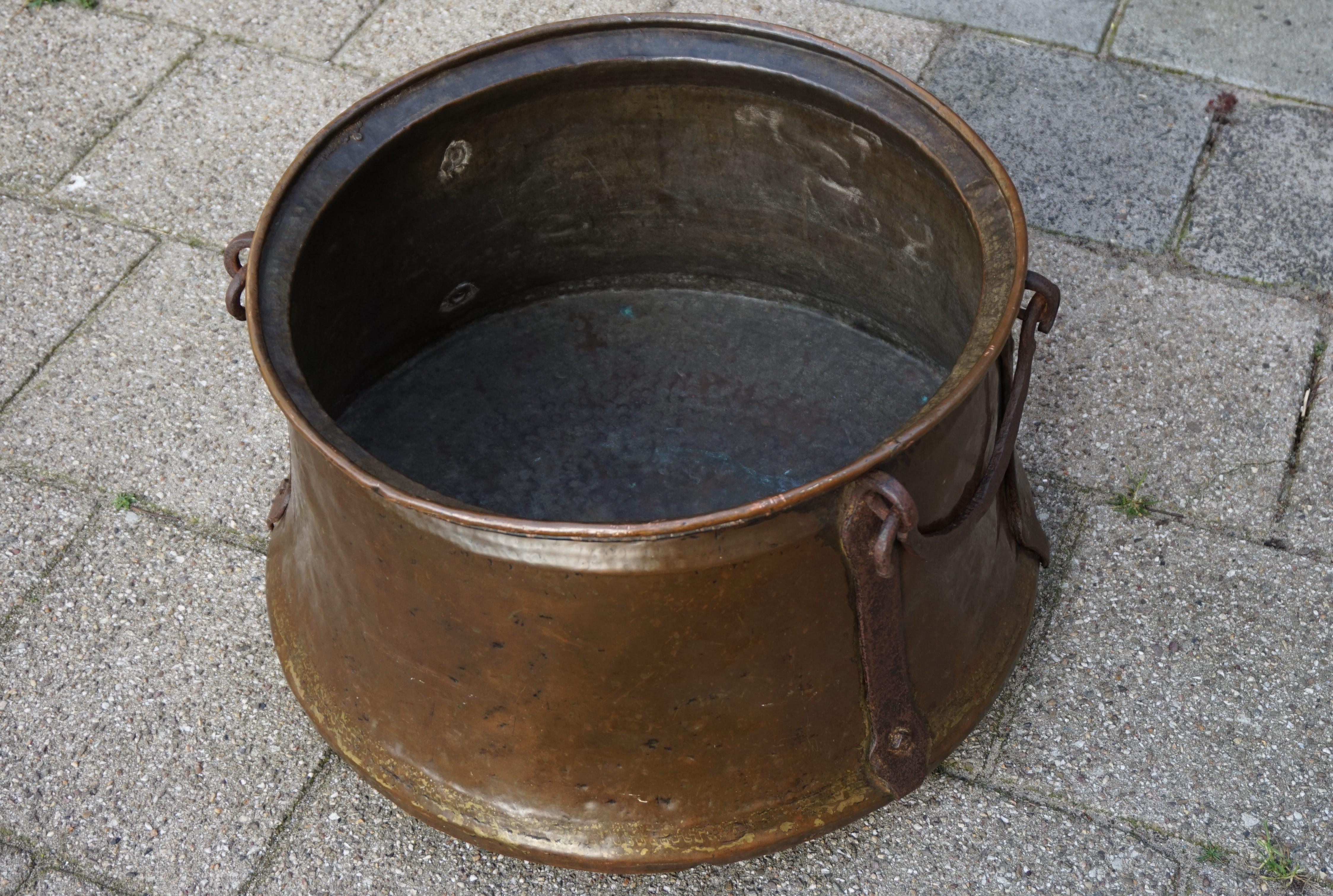 Early 1800s, rare size and highly stylish bucket with a marvelous patina.

Only if you were a very wealthy person in the Netherlands in the early 1800s, would you be able to afford such a large, impressive and all-handcrafted bucket. This stunning
