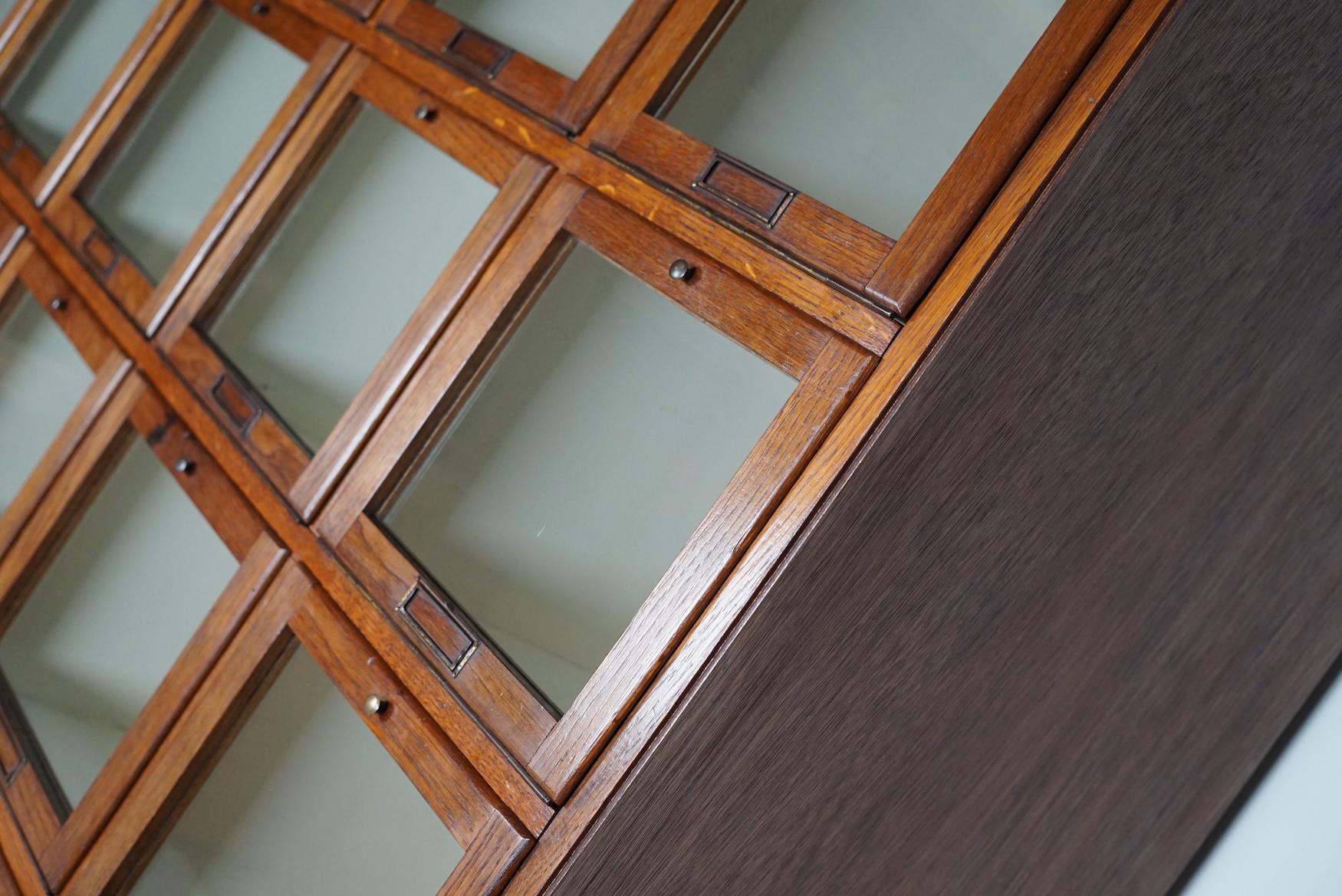 Antique Large Dutch Oak Haberdashery Shop Cabinet Folding Doors, 1920/30s In Good Condition For Sale In Nijmegen, NL