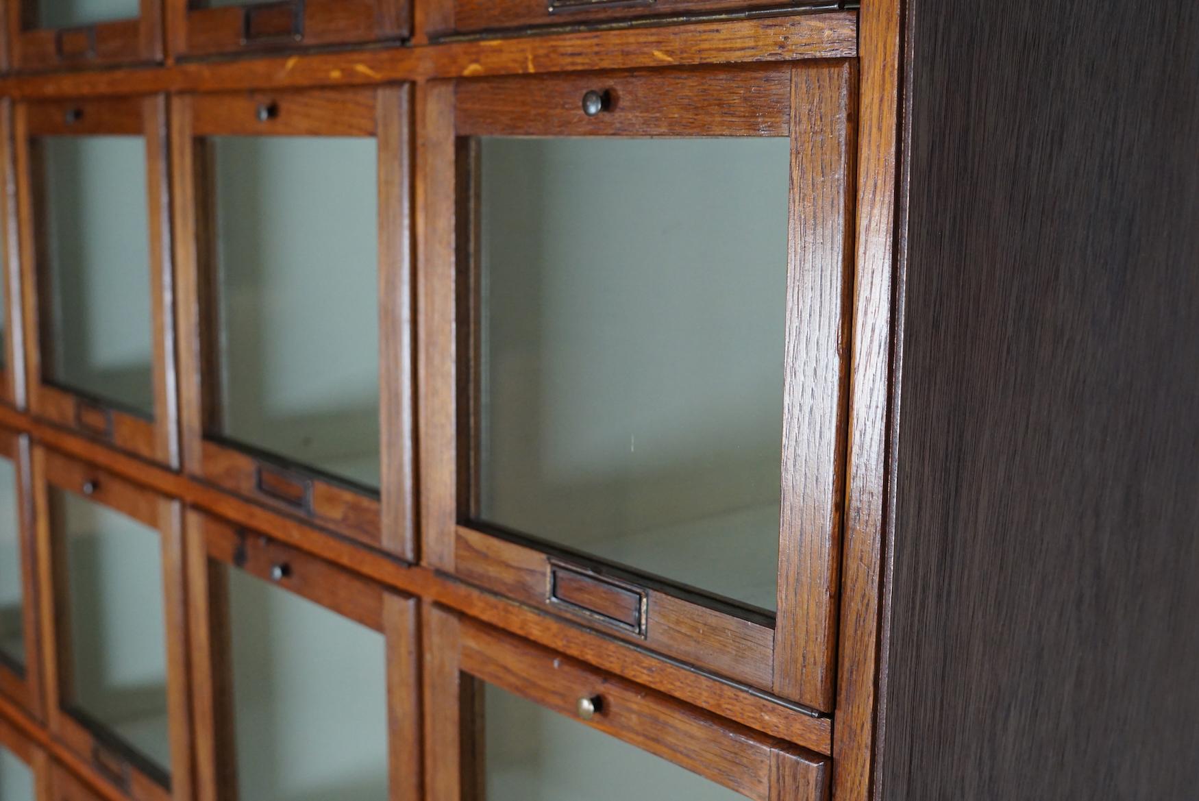 Mid-20th Century Antique Large Dutch Oak Haberdashery Shop Cabinet Folding Doors, 1920/30s For Sale