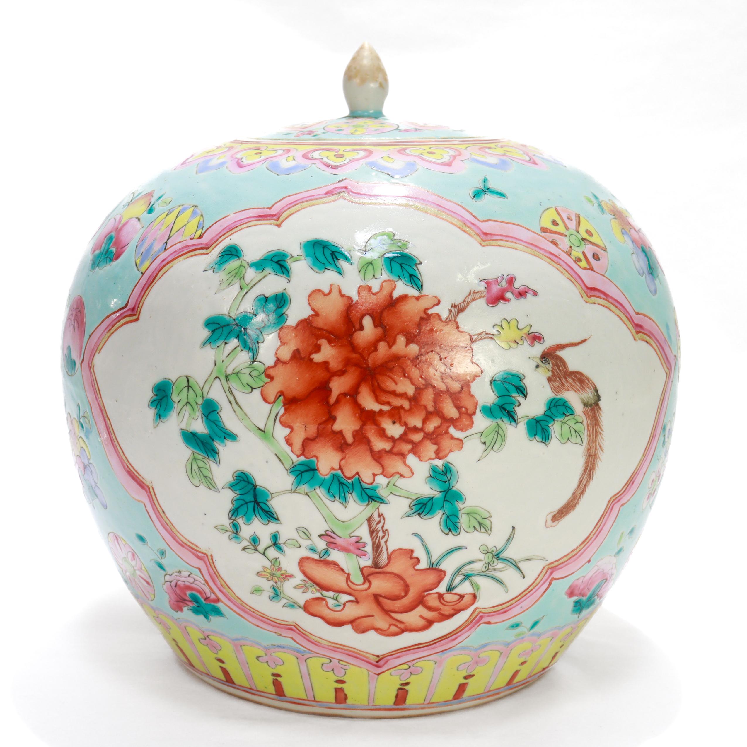 A fine antique Chinese Export Famille Rose lidded ginger jar / bojan.

In a Famille Rose pattern with a palette primarily composed of rose, turquoise, yellow, orange, and pale blue

In a stout, bulbous form with two large cartouches to either side