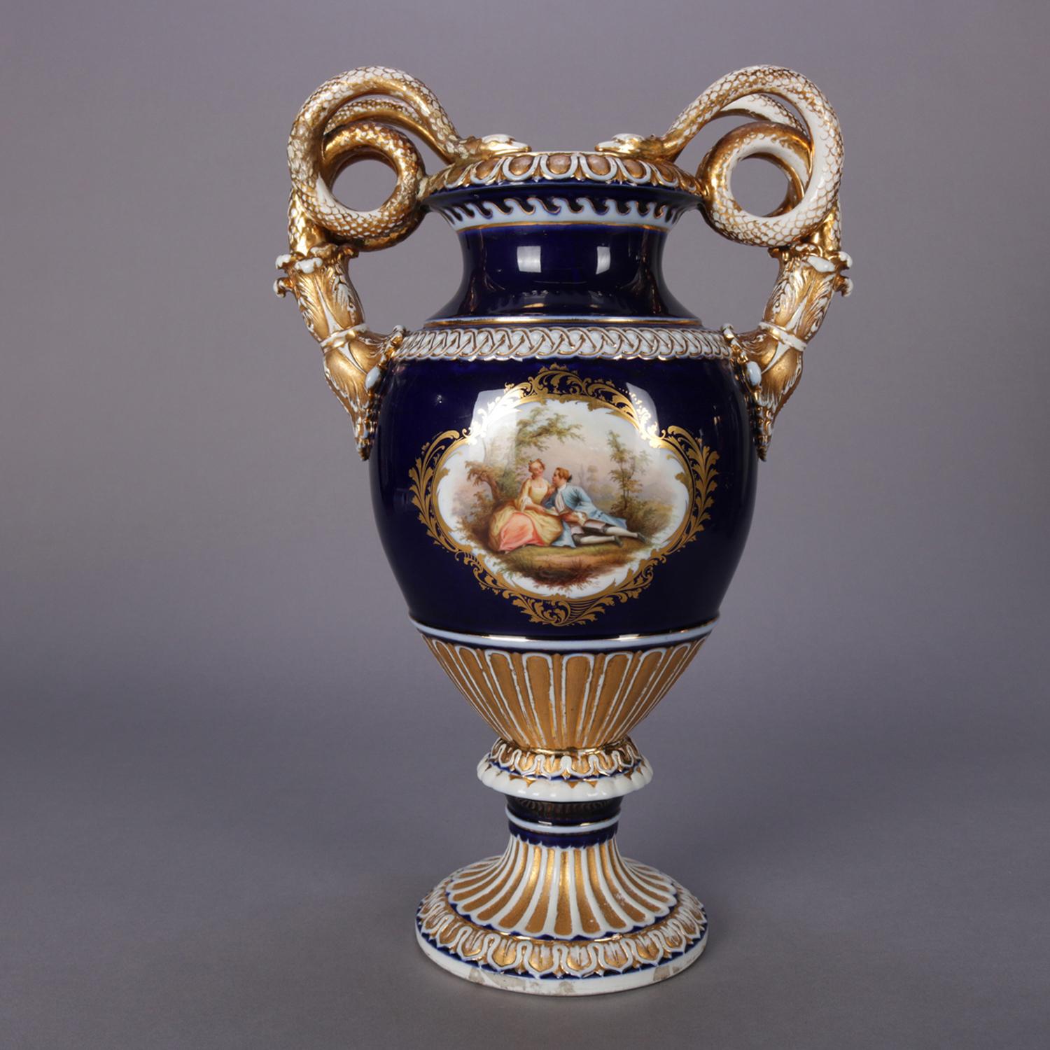 An antique and large French Sèvres Porcelain open urn featuring hand painted reserve with courting scene, double figural and gilt serpent handles, raised on reeded and gilt pedestal base, double crossed sword mark on base, circa 1880.

Measures: