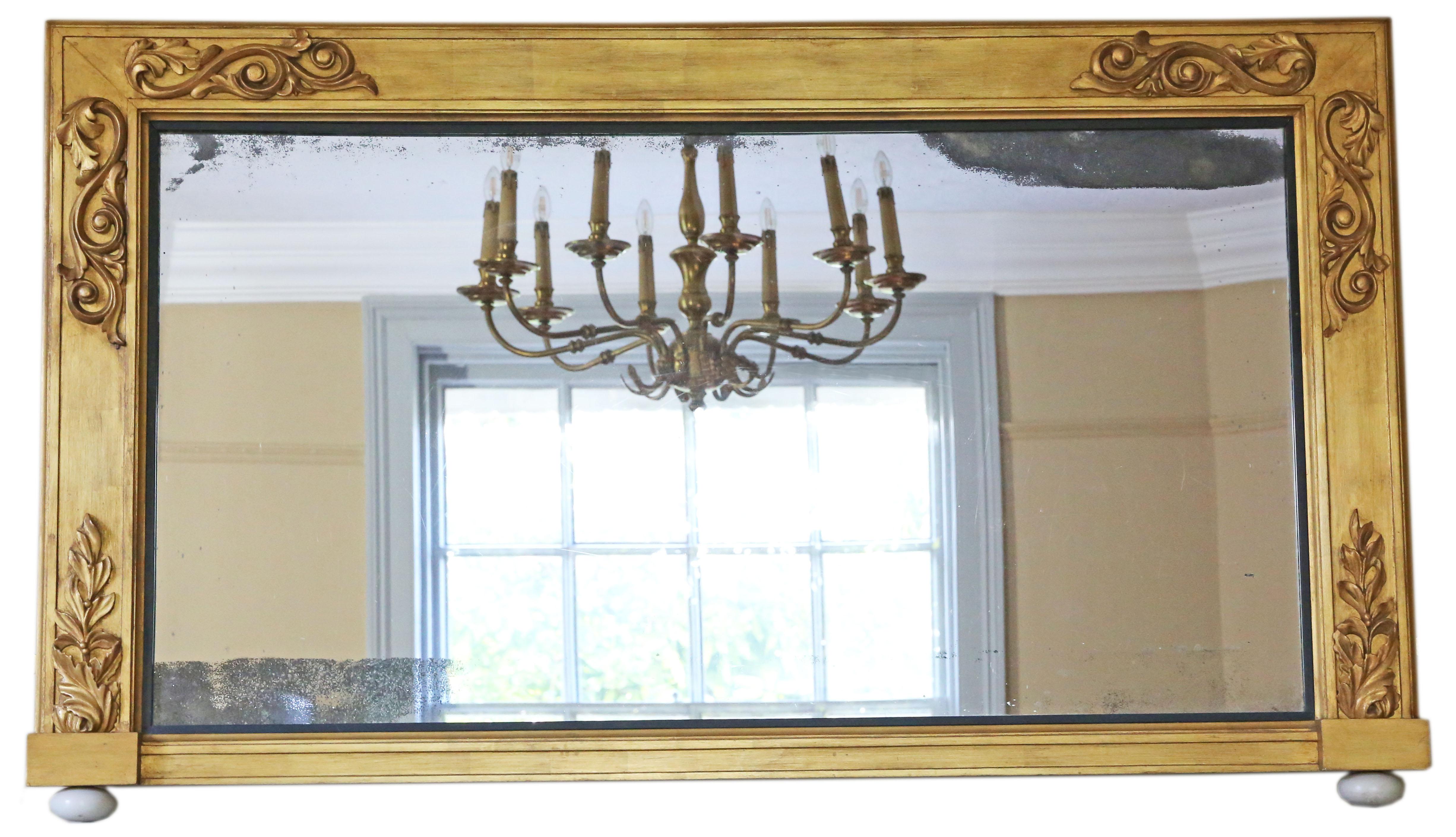 Antique large fine quality decorative giltwood overmantle wall mirror, 19th Century.

An impressive rare find, that would look amazing in the right location. No loose joints.

The original mirrored glass has medium oxidation and age related