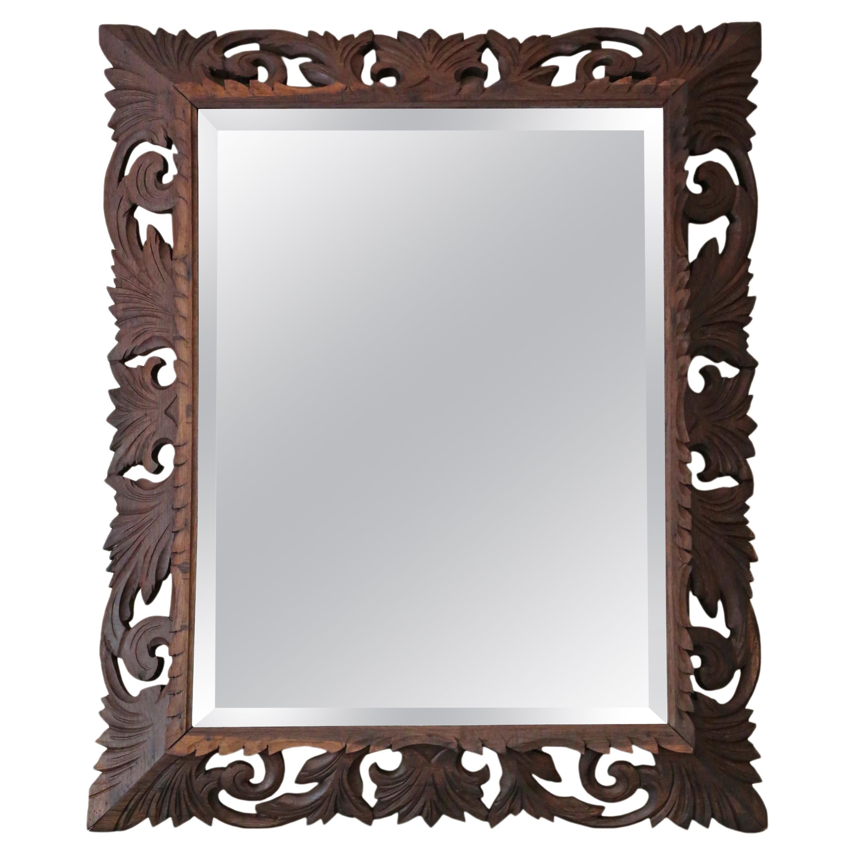 Antique Mirror, grande specchio da parete in Padauk fiorentino intagliato, sovramontato