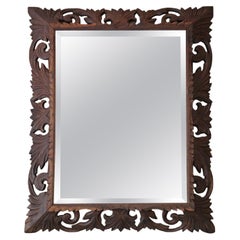 Antique Mirror, grande specchio da parete in Padauk fiorentino intagliato, sovramontato