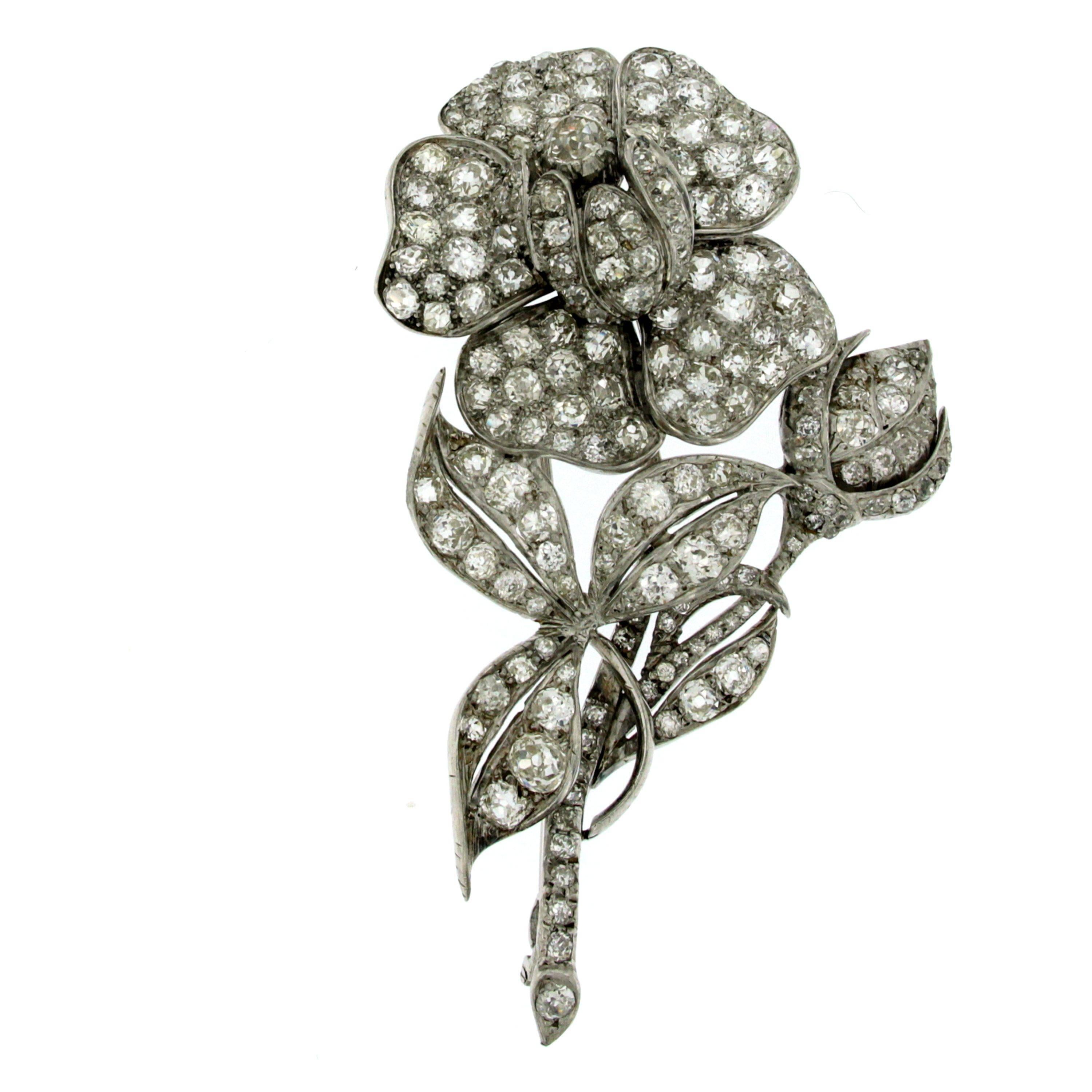 Stunning hand crafted floral design Brooch, set with approx. 190 Old Mine Cut Diamonds, total weight 20 carat graded I color SI clarity, 18k white gold mounting; This piece is designed and crafted entirely by hand in the traditional way, using age