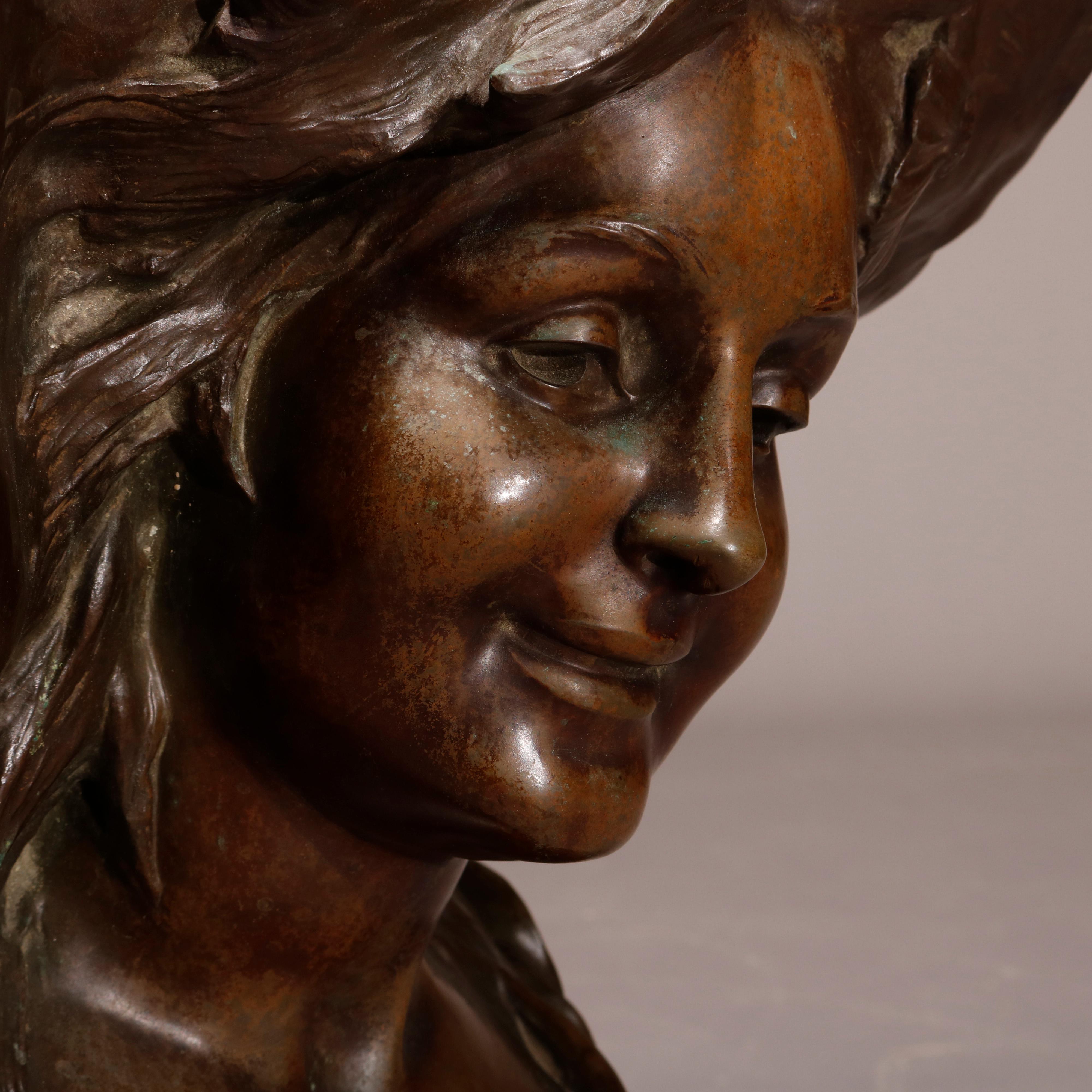 An antique and large French Art Nouveau portrait sculpture of a woman wearing a hat, artist signed illegible, circa 1890.

Measures: 22.5