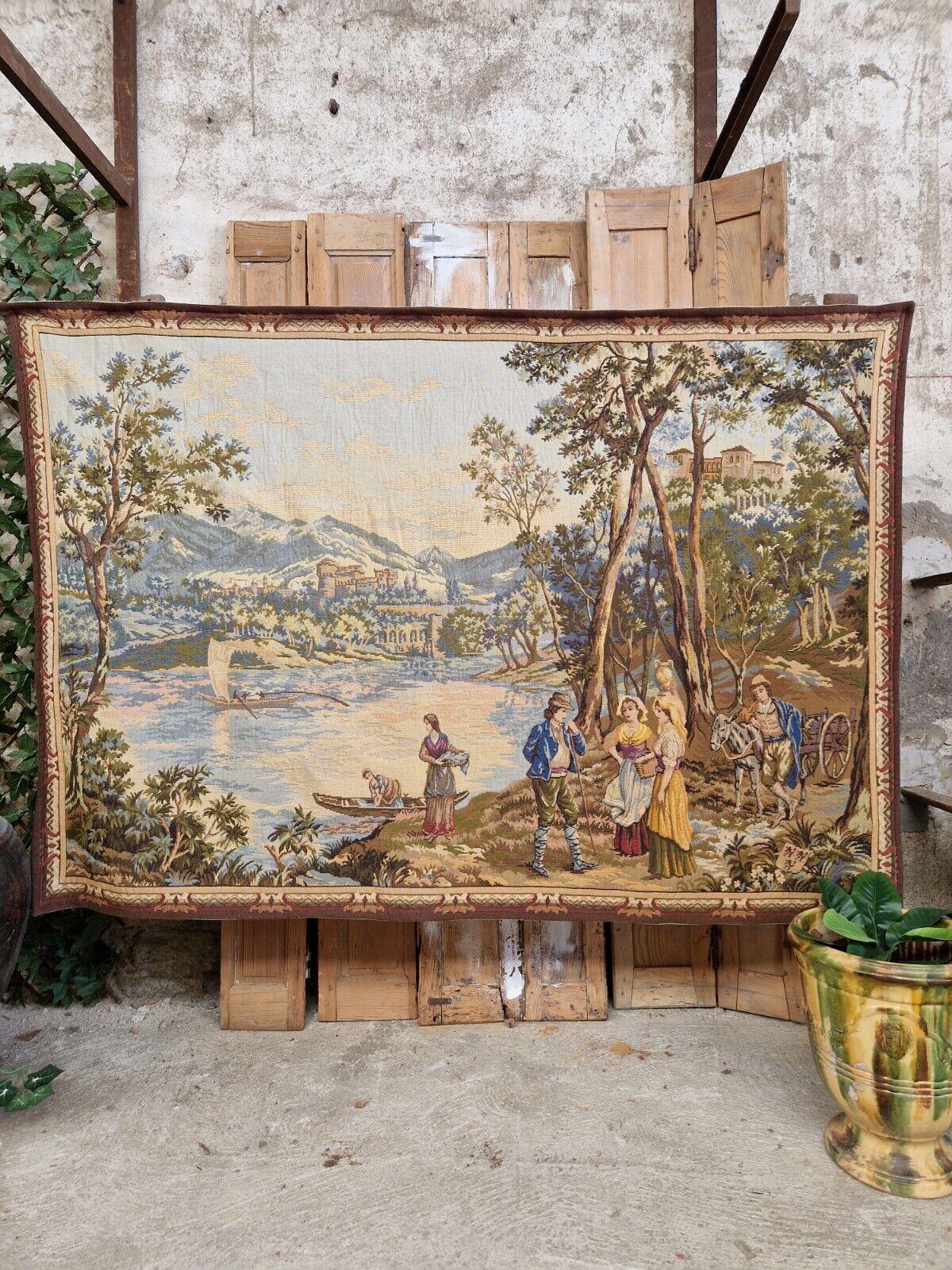 This beautiful and unique Aubusson tapestry is a stunning piece of French history. Measuring at 126 x 181 cm, it is large enough to make a statement in any room. The multicoloured gallant scene is intricately woven with cotton material, making it