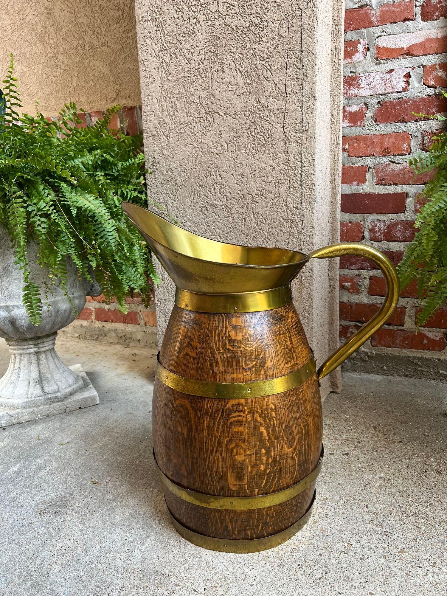 Antique Large French Country Oak Pitcher Brass Band Wine Barrel Umbrella Stand.

Direct from France, a beautiful antique French farm pitcher or vessel, with SOLID OAK staves. Customers love these jugs for farm table décor, umbrella stands, planters