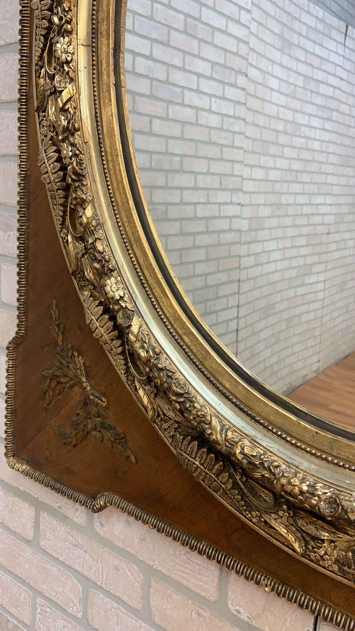 Hand-Carved Antique Large French Napoleon III Caved Gold Gilded Wood Medallion Wall Mirror For Sale