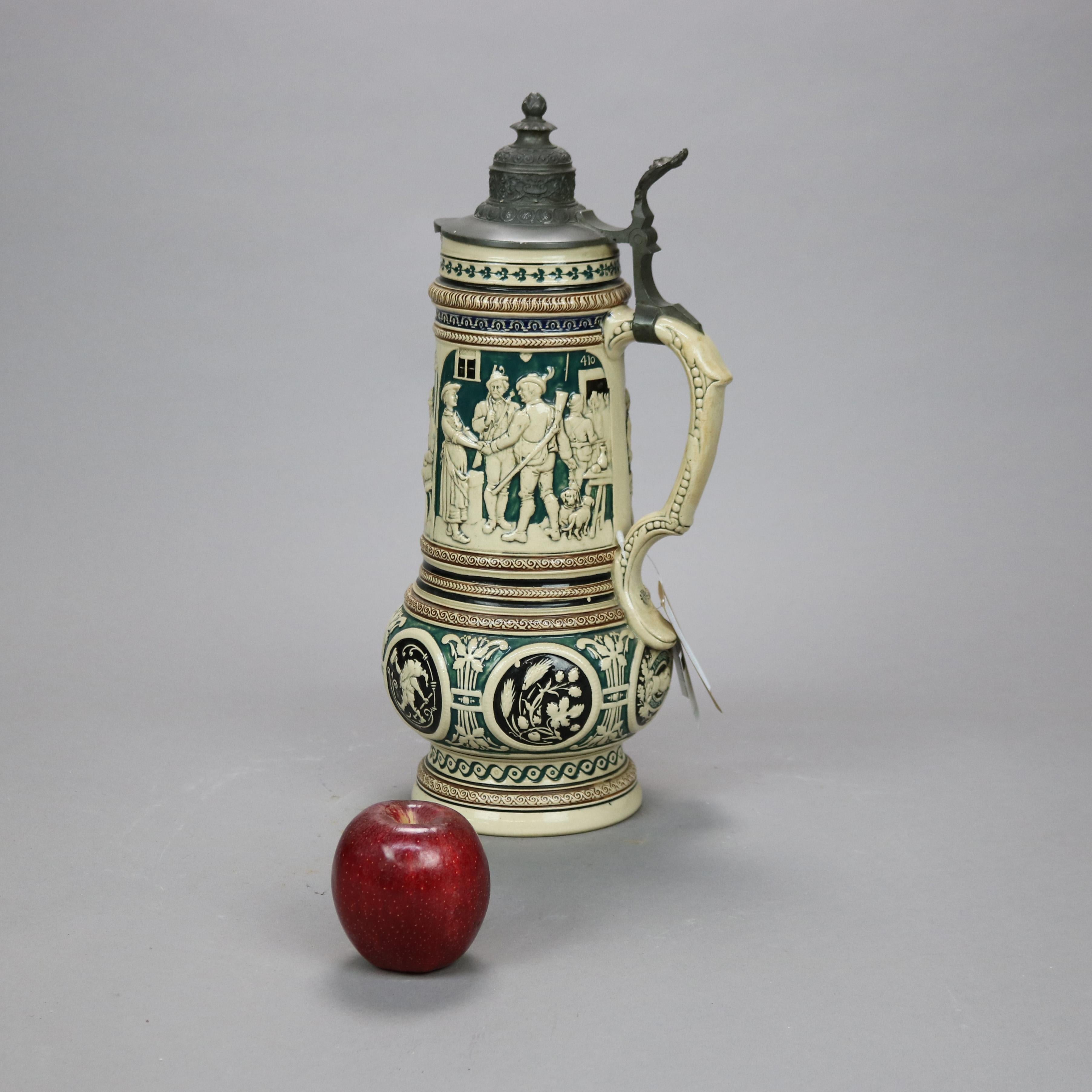 An antique and large German beer stein offers stoneware construction with genre scenes and hinged pewter lid, c1900

Measures - 15.75'' H x 8'' W x 8'' D.

Catalogue Note: Ask about DISCOUNTED DELIVERY RATES available to most regions within 1,500
