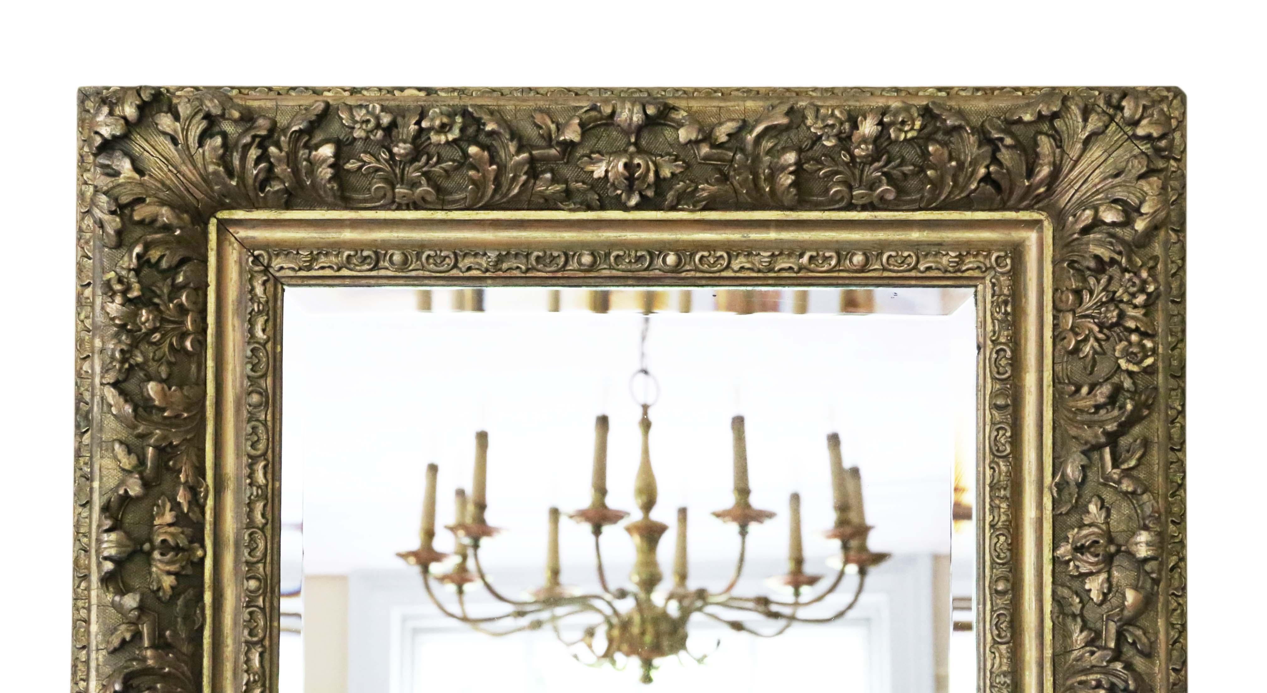 Antique large fine quality gilt 19th century overmantle / wall mirror. Lovely charm and elegance. Could be hung in portrait of landscape.

An impressive and rare find, that would look amazing in the right location. No loose joints.

The later
