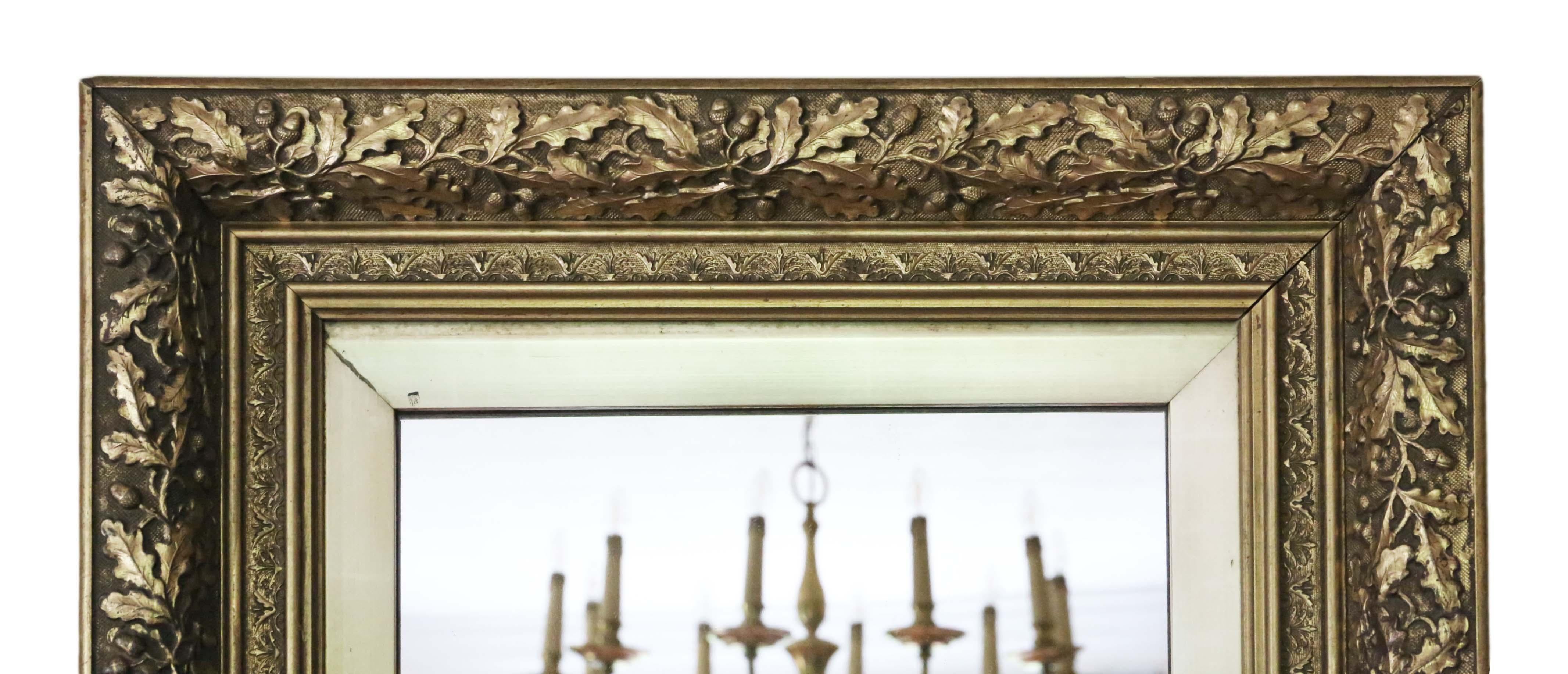 Antique large fine quality gilt 19th century overmantle / wall mirror. Lovely charm and elegance. Could be hung in portrait or landscape.

An impressive and rare find, that would look amazing in the right location. No woodworm.

The mirrored