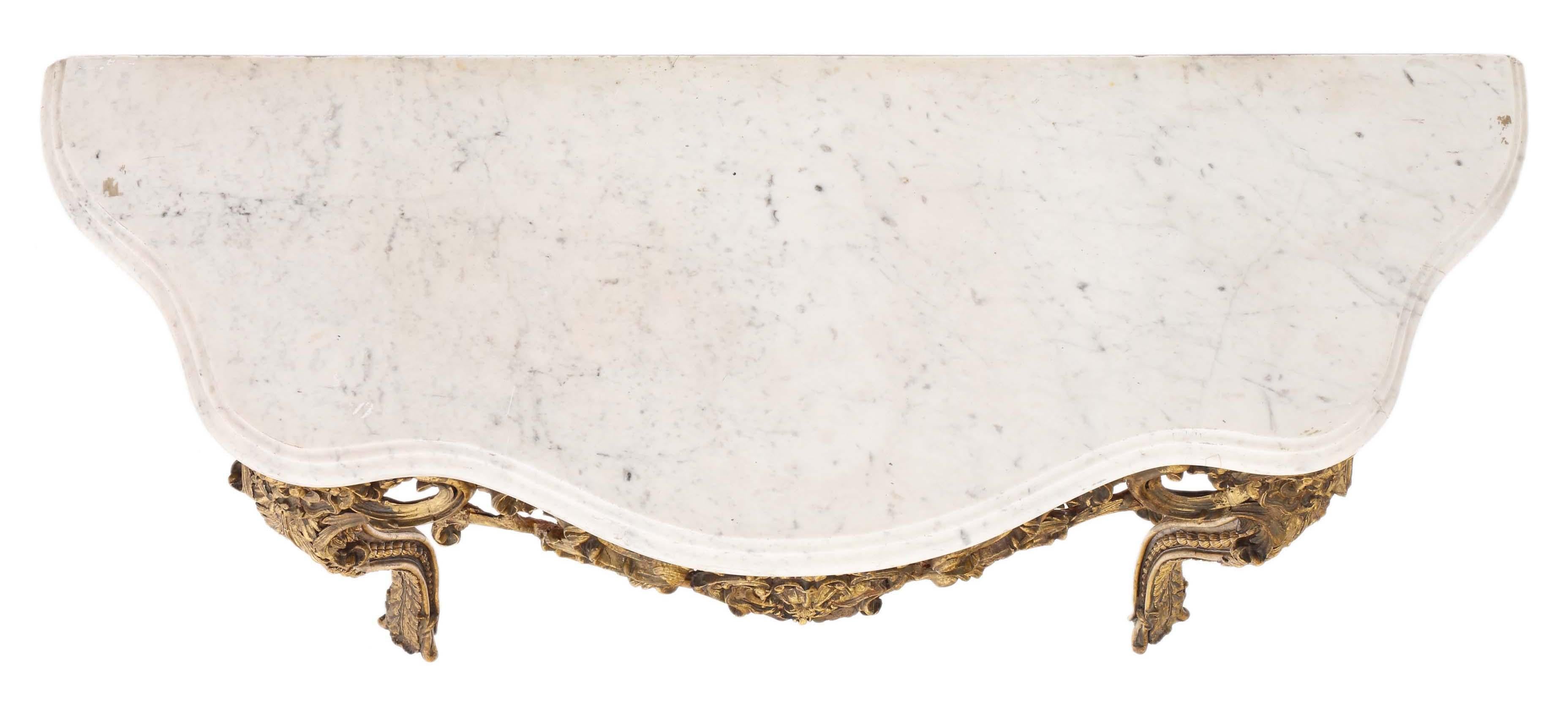 Antique large fine quality gilt and marble console table. This is a Regency revival piece dating from the early 20th Century C1920.

The table has a lovely age, colour and patina. The finishes are in good order, with decorative losses and touching