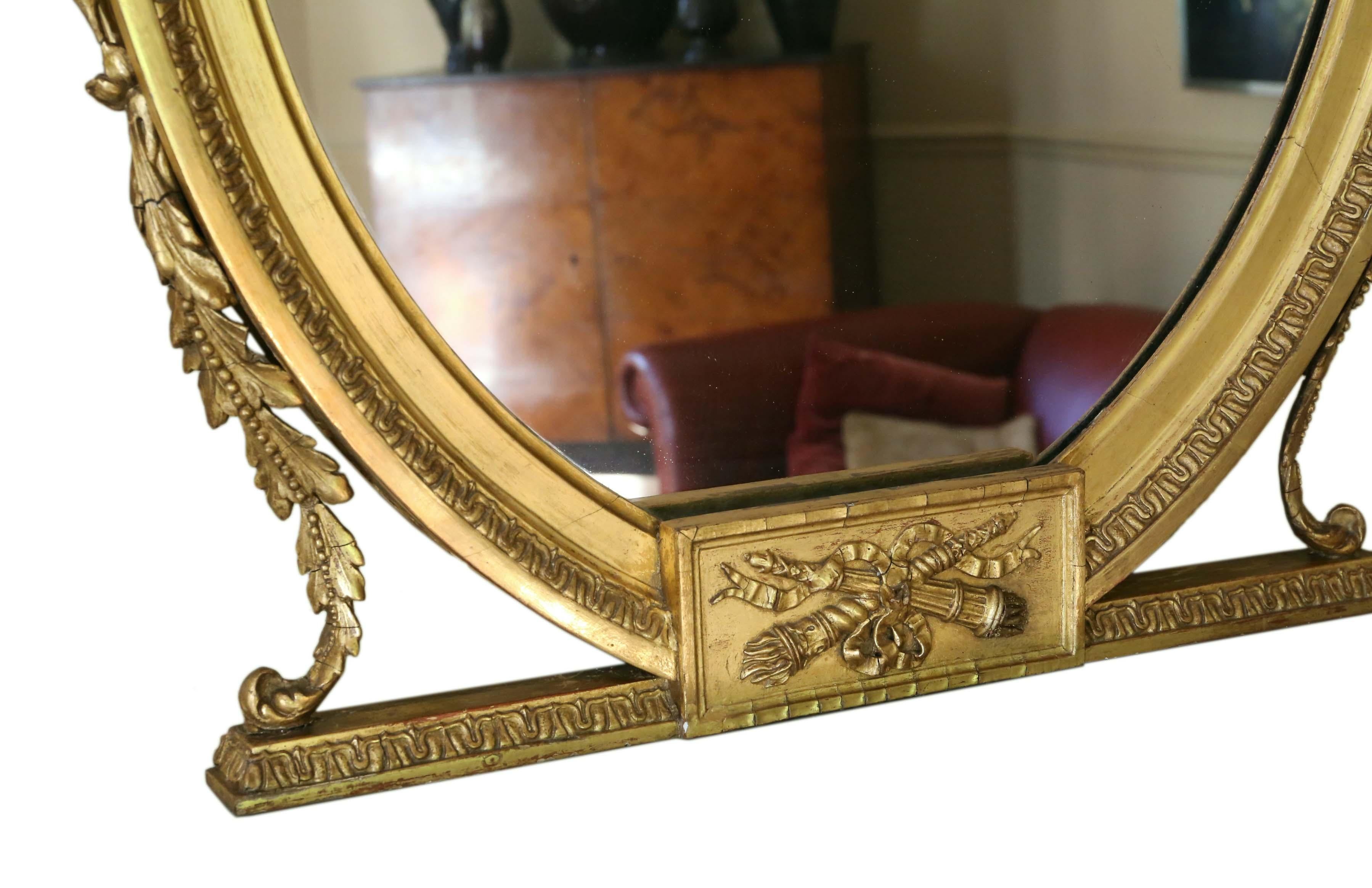 Début du 20ème siècle Grand miroir mural ovale doré d'antiquités, vers 1900 en vente