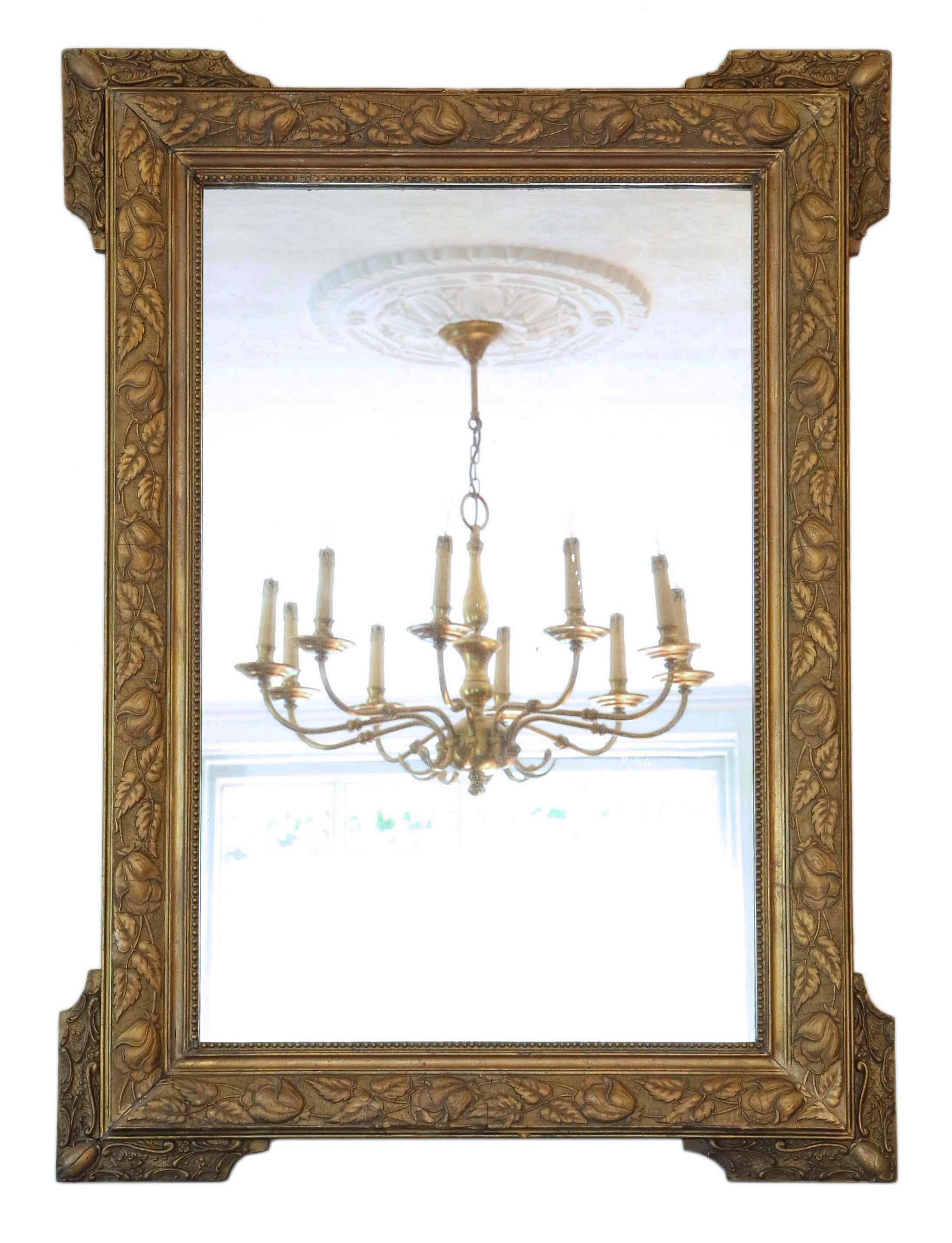 Antique large quality gilt wall mirror overmantle from the 19th Century. Could be hung in portrait or landscape.

An impressive find, that would look amazing in the right location. No loose joints.

Original mirrored glass with light oxidation,