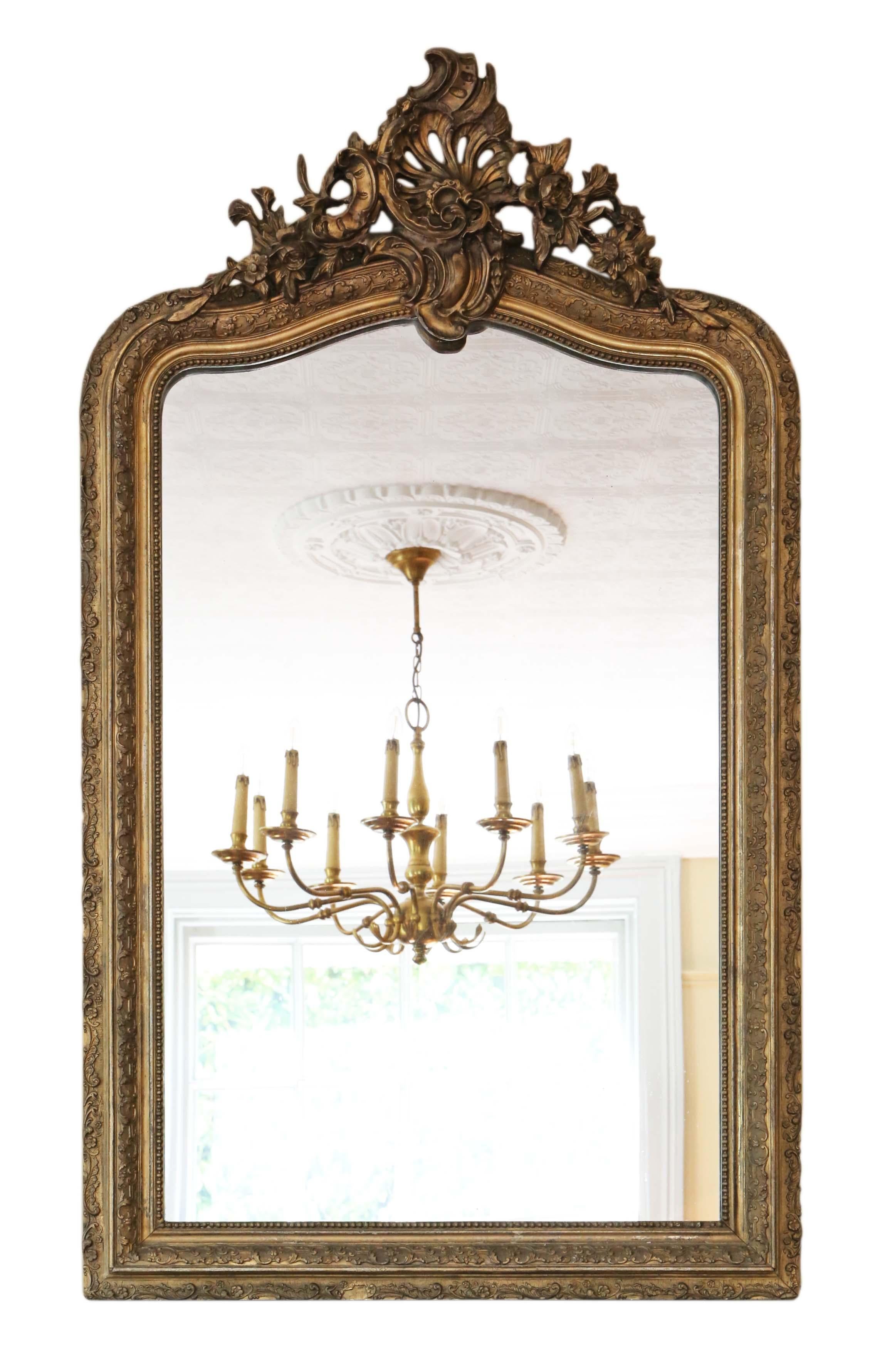 Antique large fine quality gilt wall mirror or overmantle, late 19th century, C1895. Lovely charm and elegance.

An impressive rare find, that would look amazing in the right location. No loose joints.

The original mirrored glass is in good