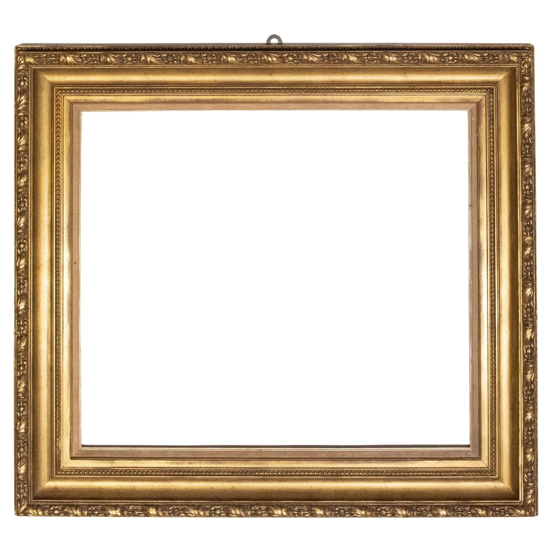 Grand cadre en bois doré ancien, également pour miroir