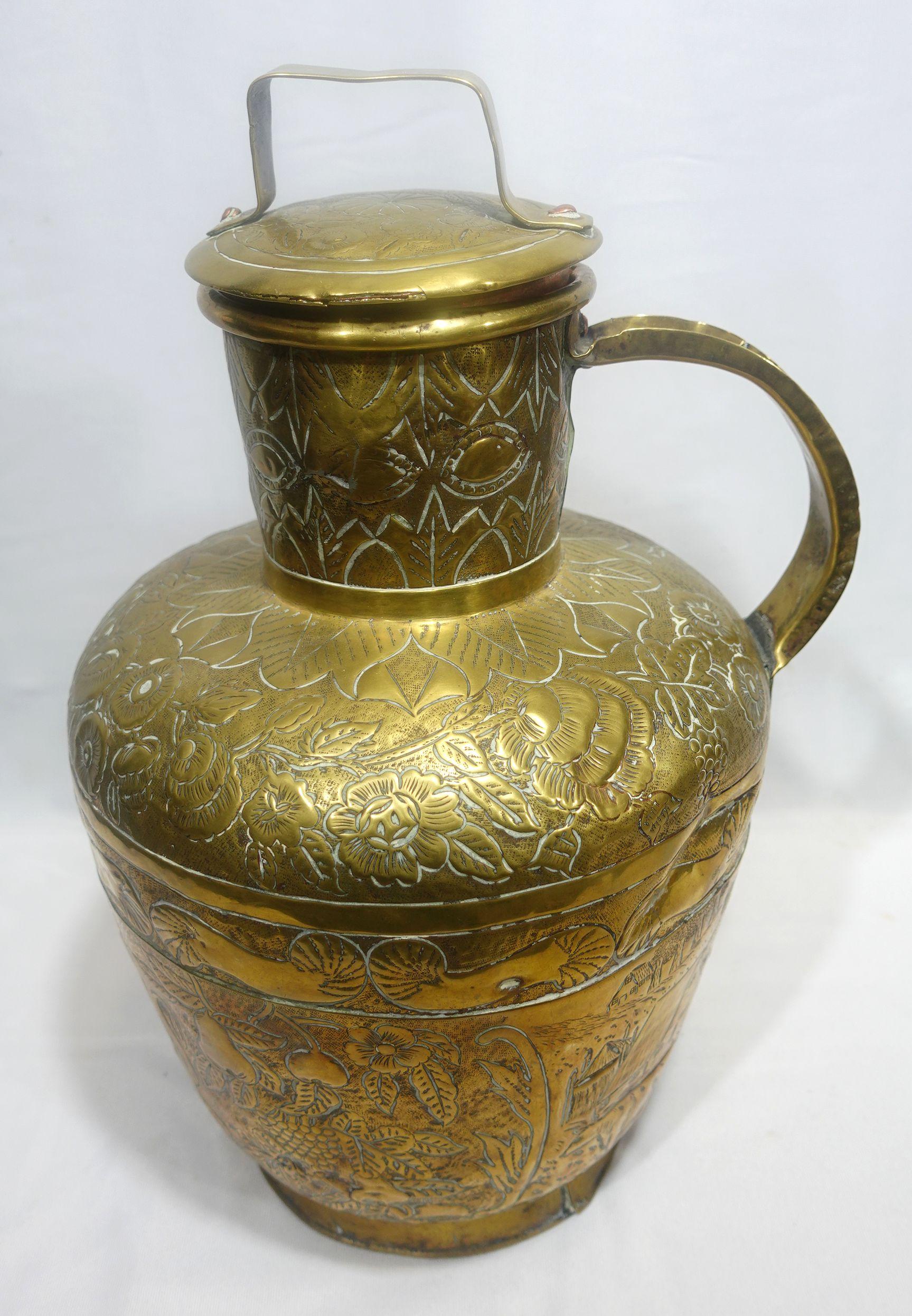 French, Large, and Heavily Embossed Brass Jar with Cover, depicting the fruit tree of pear, leaves, and some other plants on the entire jar, very delicate and excellent workmanship.

