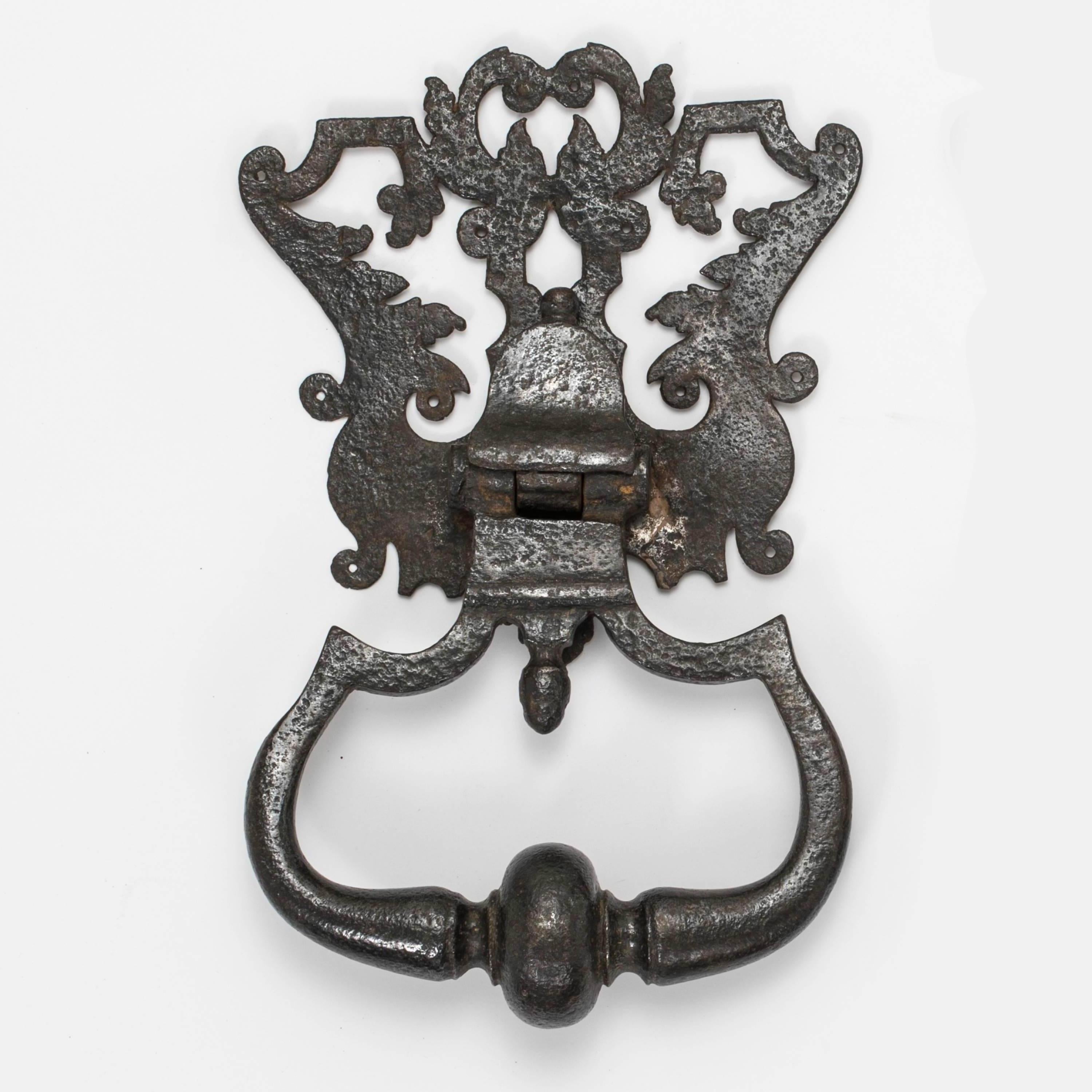 Large scaled, fantastic handmade iron door knocker. Upper part is cut design with hinged solid iron knocker.
Probably belonged on a huge ancient Italian door.
Rustic aged over the years, great looking!
 
