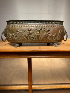 Antique Large Jardiniere / Planter Embossed with Putti Sculptures in Deep Relief