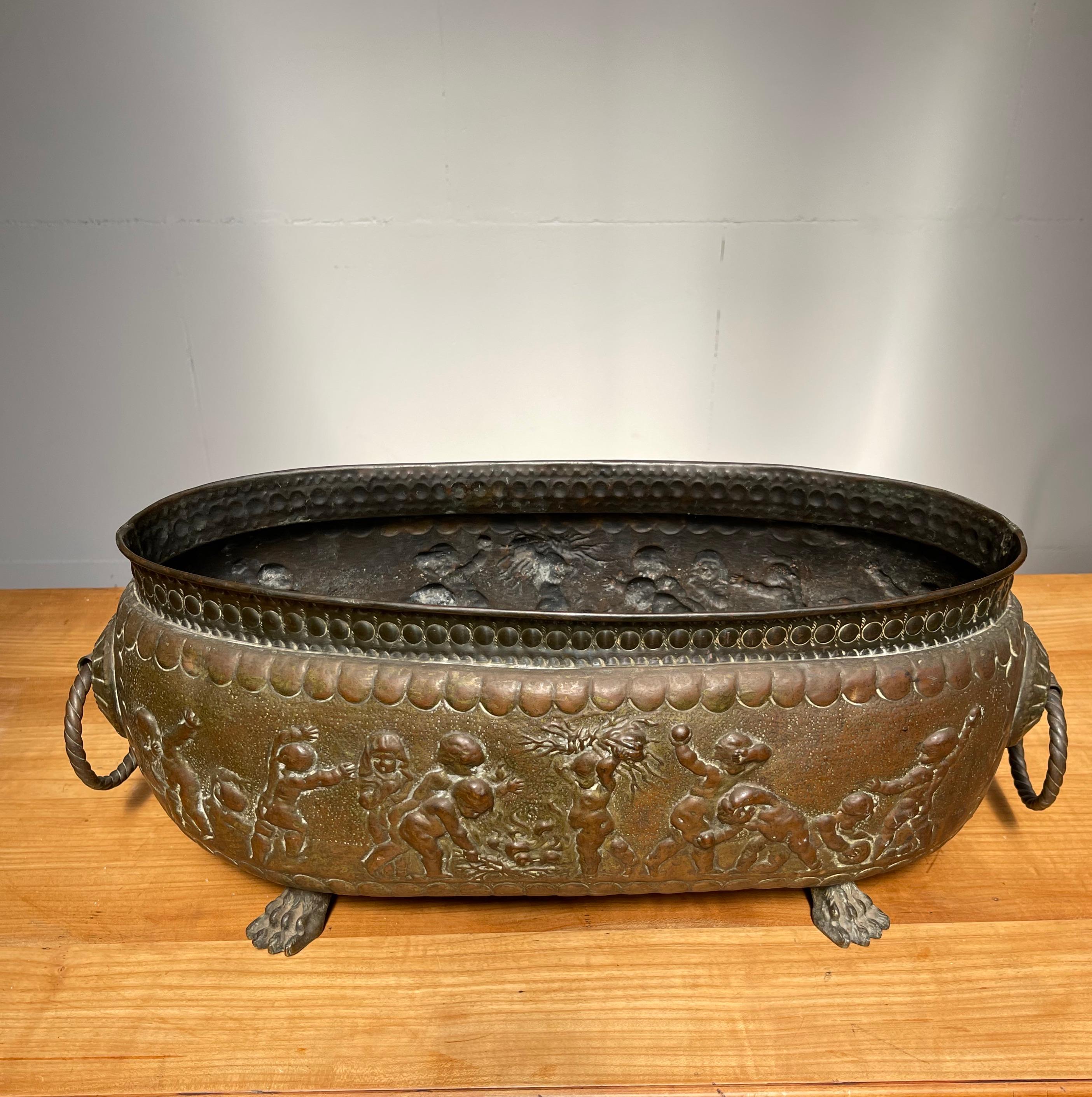 French Antique Large Jardiniere / Planter Embossed with Putti Sculptures in Deep Relief For Sale