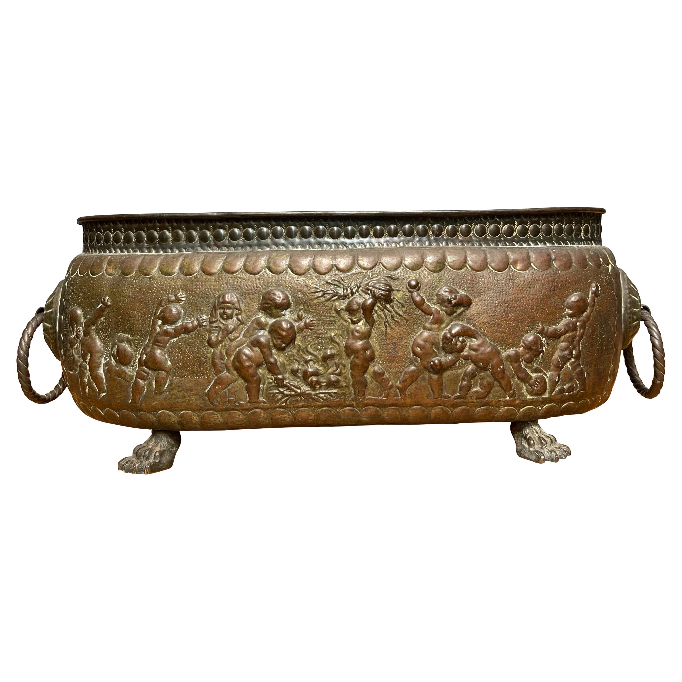 Antique Large Jardiniere / Planter Embossed with Putti Sculptures in Deep Relief For Sale