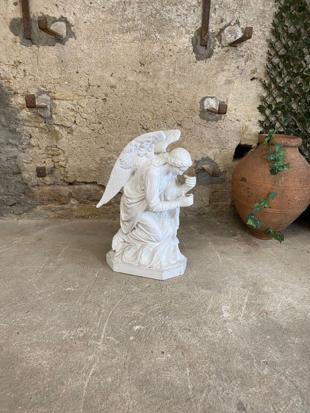 
This antique French plaster kneeling statue is from a Parisian Church, it features a stunning horse hair plaster sculpture of a female angel figure. The intricate details and exquisite craftsmanship make it a truly unique piece for any collector or
