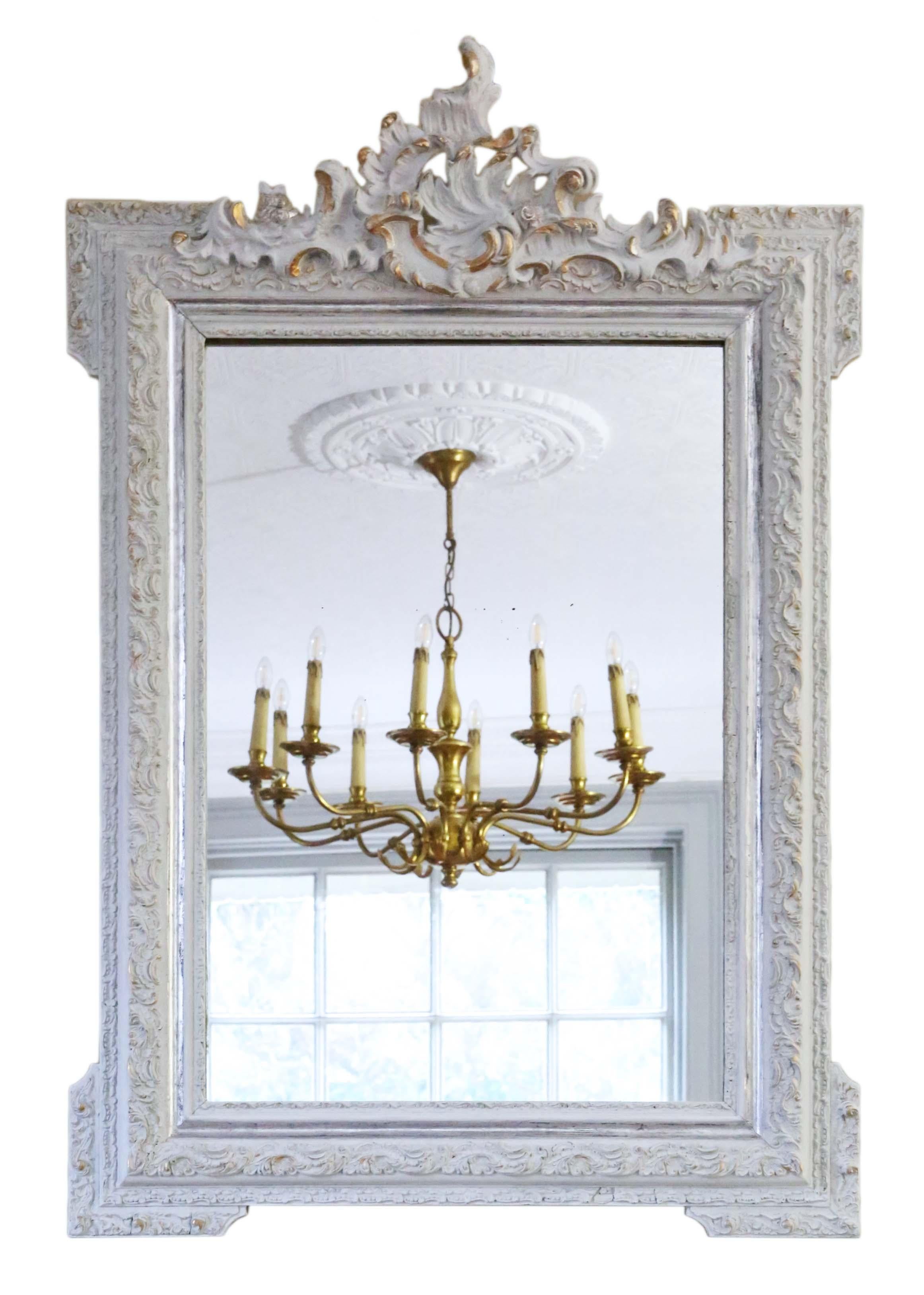 Antique large quality light grey and gilt overmantle or wall mirror C1900. Lovely charm and elegance. The mirror has its original glass and back, with a later finish on the frame. Minor losses and touching up here and there to the frame.

An