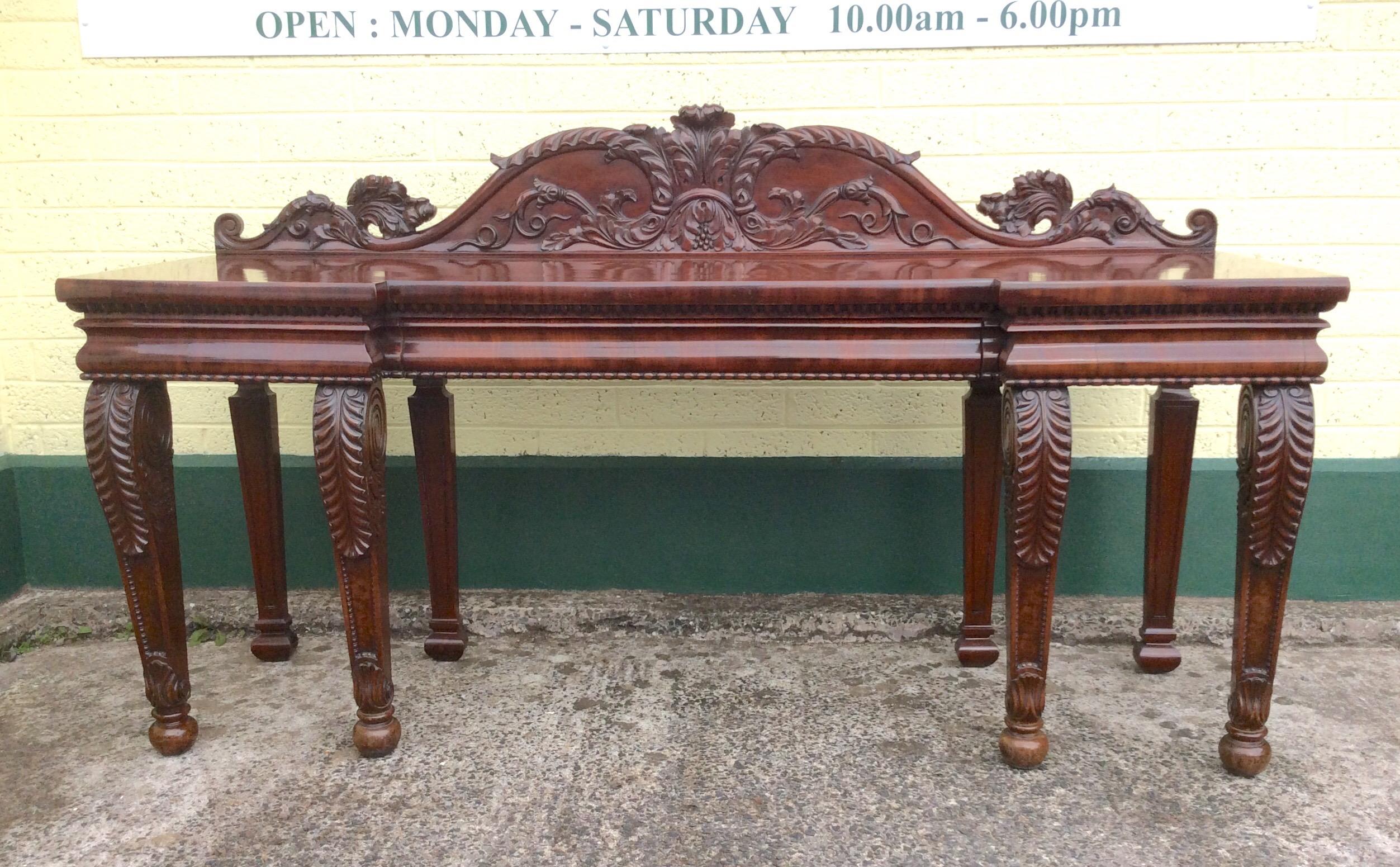 Magnificent antique period Regency inverted breakfront Cuban mahogany serving, console, hall table
Attributed to Gillows 
Very fine quality carving and wonderful period patina and colour.
Drawer to front.

Measures: 230 cm wide x 73 cm deep x 97 cm