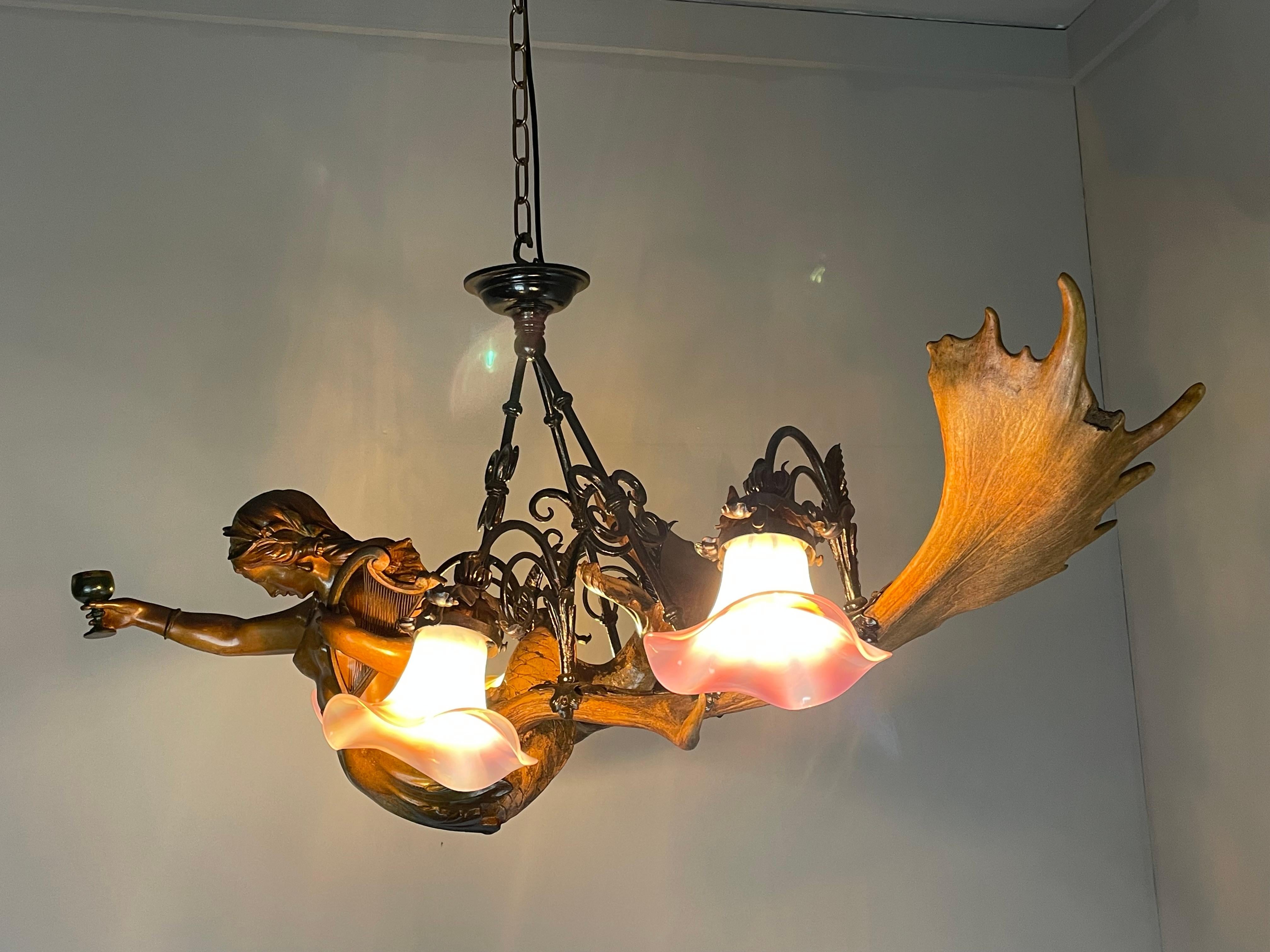 Rare, large, artistic and highly decorative antique chandelier. 

For the collectors and for the interior designers who are always looking for rare Medieval Style antiques we also have this all original, work-of-art chandelier from the earliest