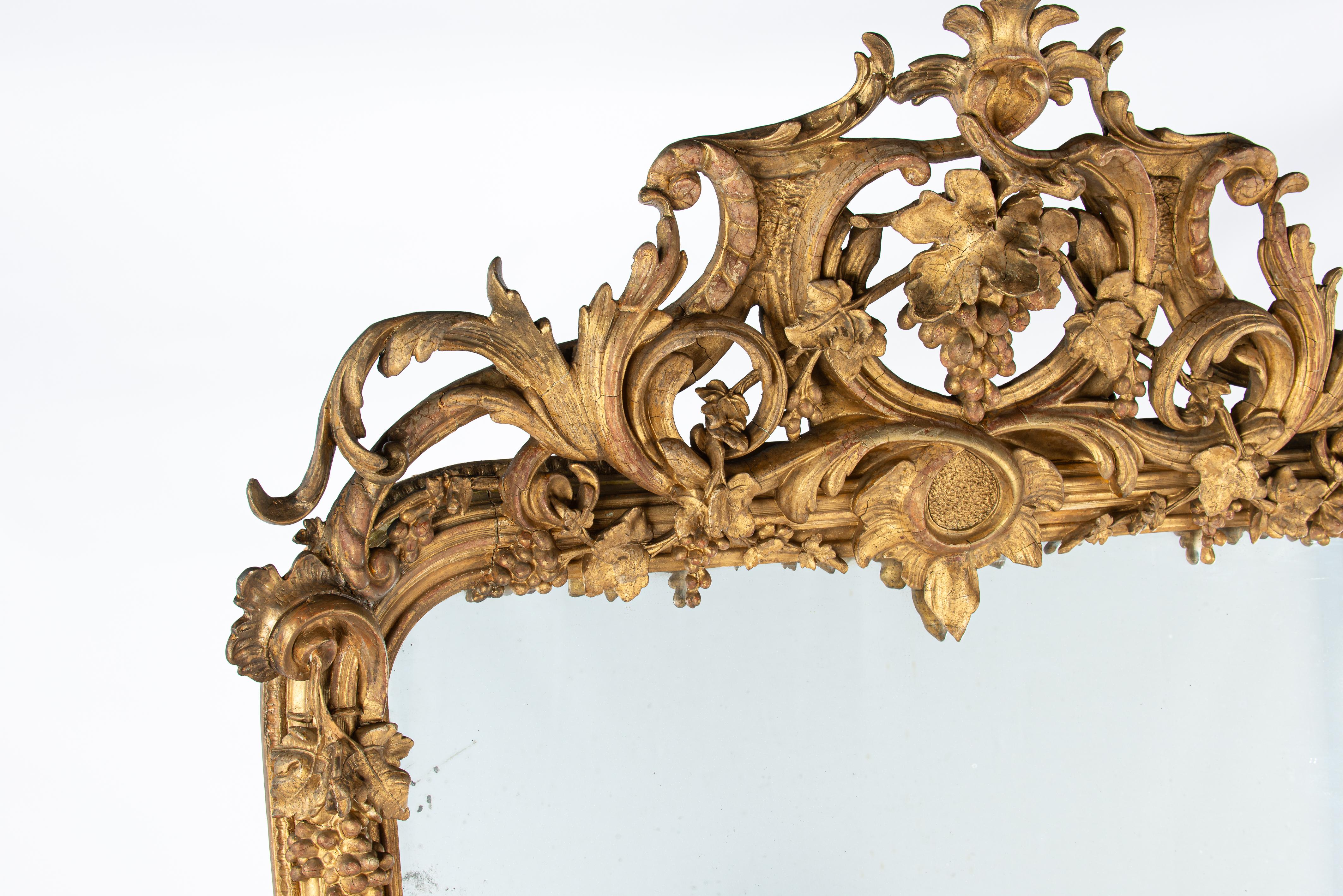 Hand-Carved Antique Large Monumental gold leaf gilt French ornamented Louis Philippe Mirror  For Sale