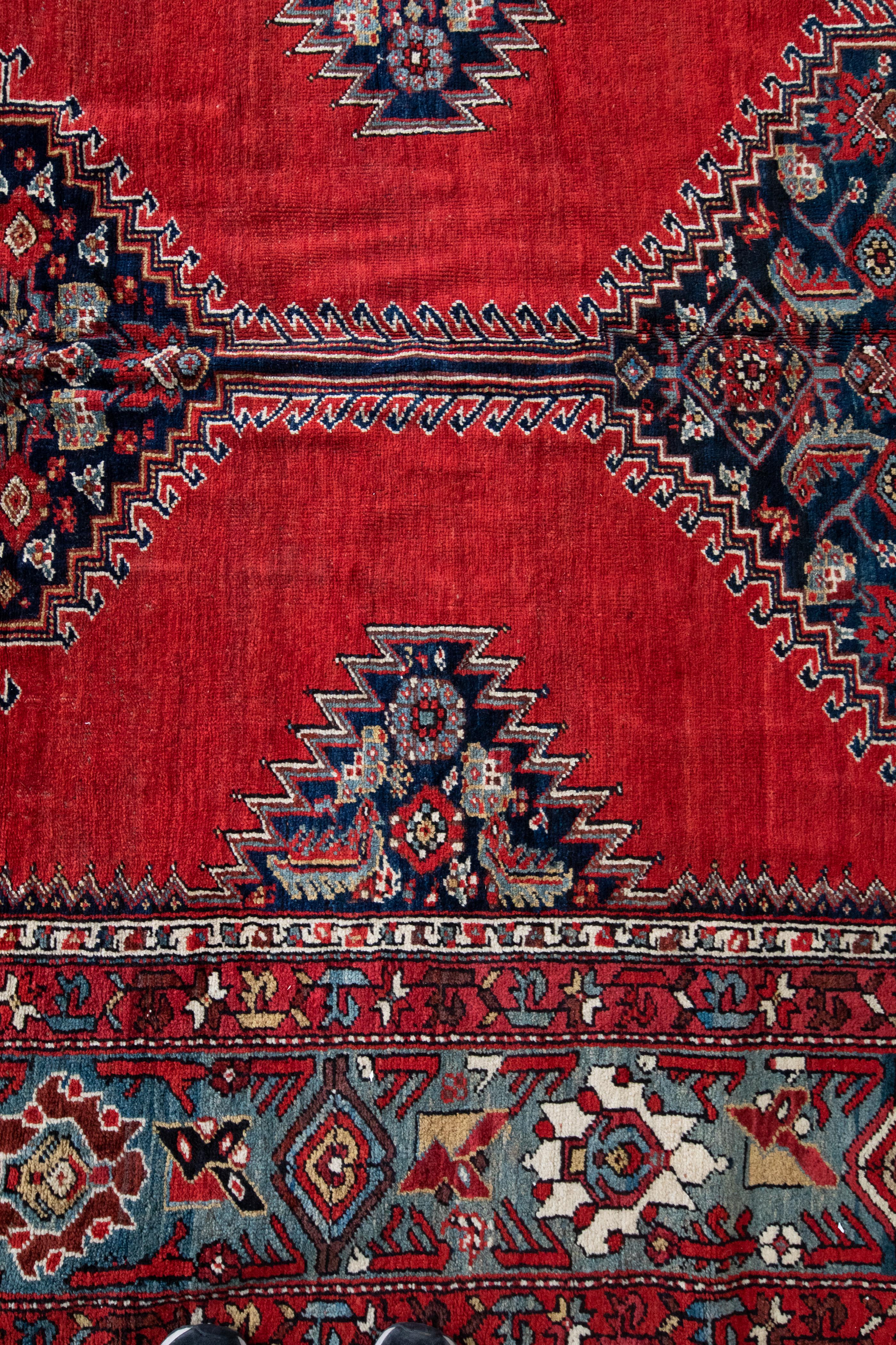 This lovely antique Northwest Persia geometric tribal red rug, circa 1900s-1920s, measures: 7.1 x 19.5 ft.

Bijar rugs are mainly woven in the town of Bijar and its surrounding villages. Bijar is located in the province of Kurdistan in Northwest of