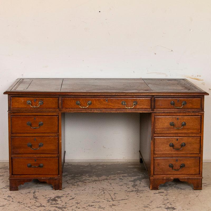 large oak desk with drawers