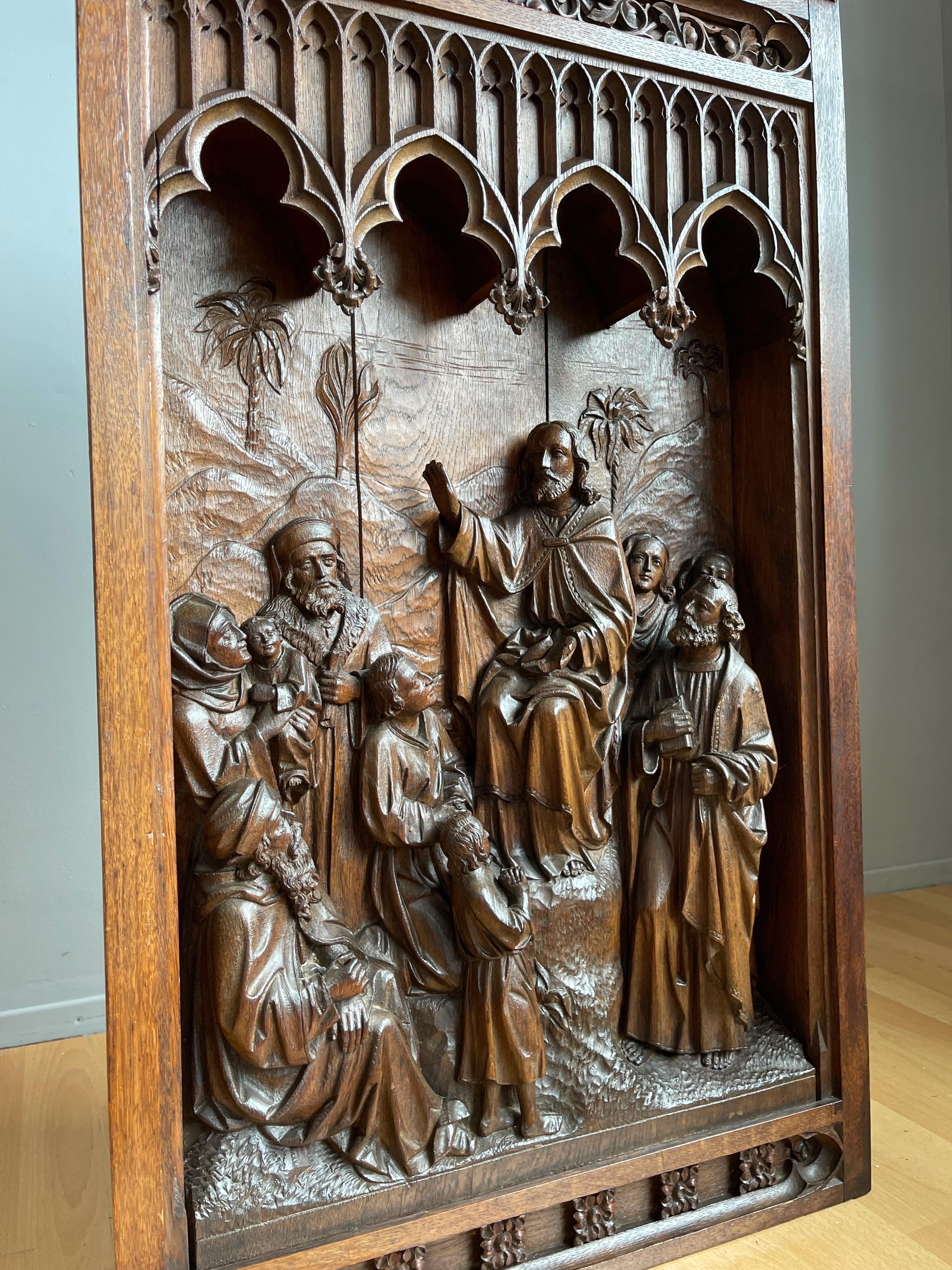 Gothic Revival 'sermon on the mount' wall plaque with Jesus teaching.

This large size work of religious art depicts Jesus and He is surrounded by both grown-ups and children on either side. This Gothic church wall panel looks to be from the Dutch