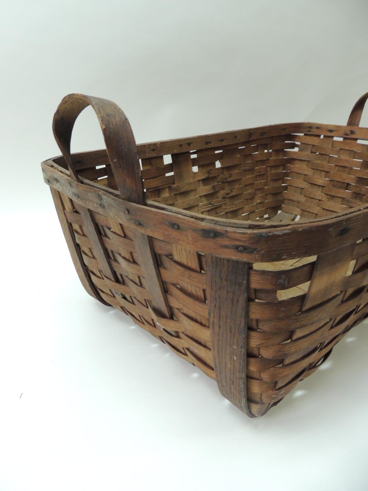 large flat basket with handle