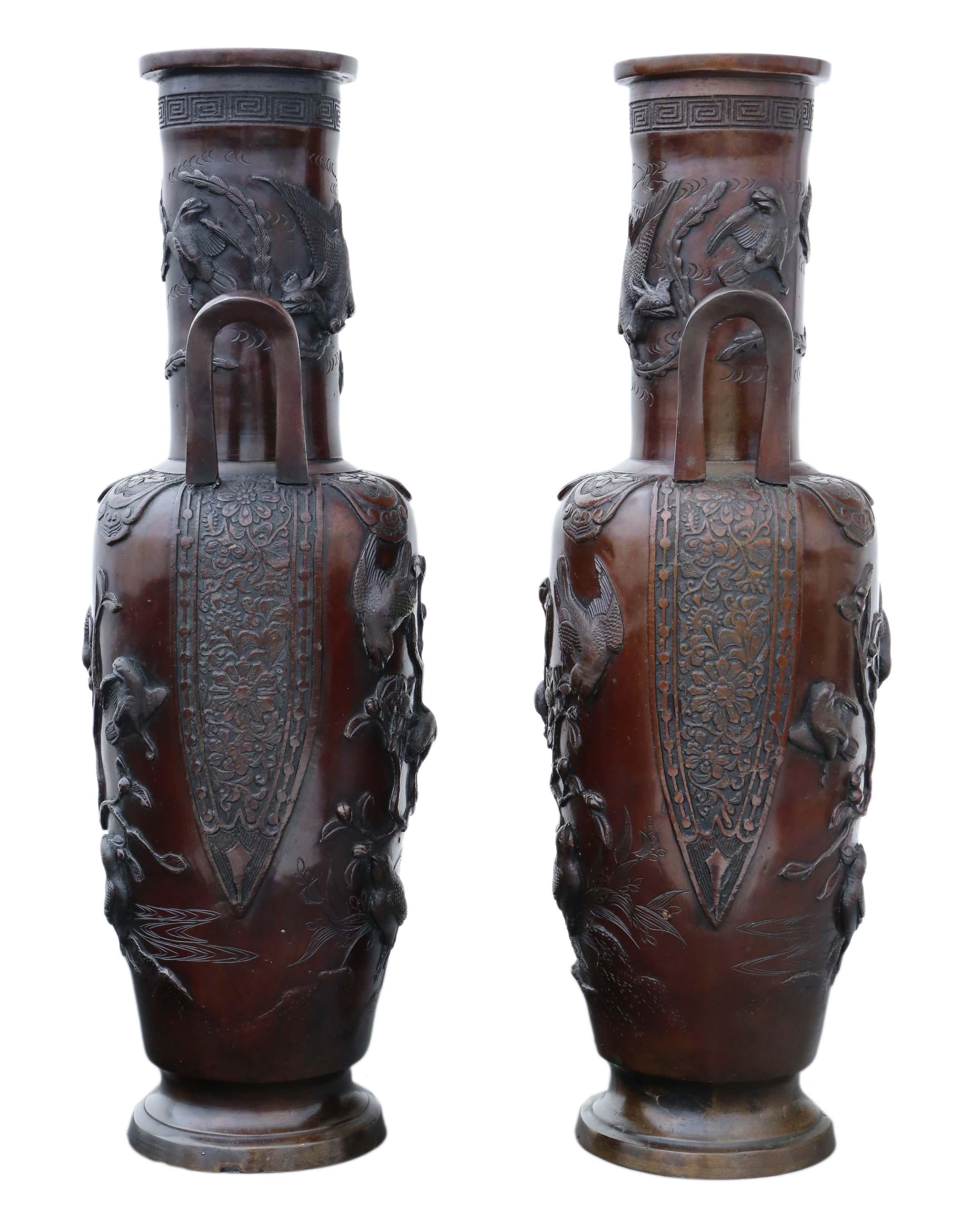 Antique large fine quality pair of Japanese bronze vases. Late 19th century Meiji period. 

Would look amazing in the right location. The very best color and patina.

Overall maximum dimensions: 50cm high x 18cm diameter. Weigh 5.2Kg each.

In