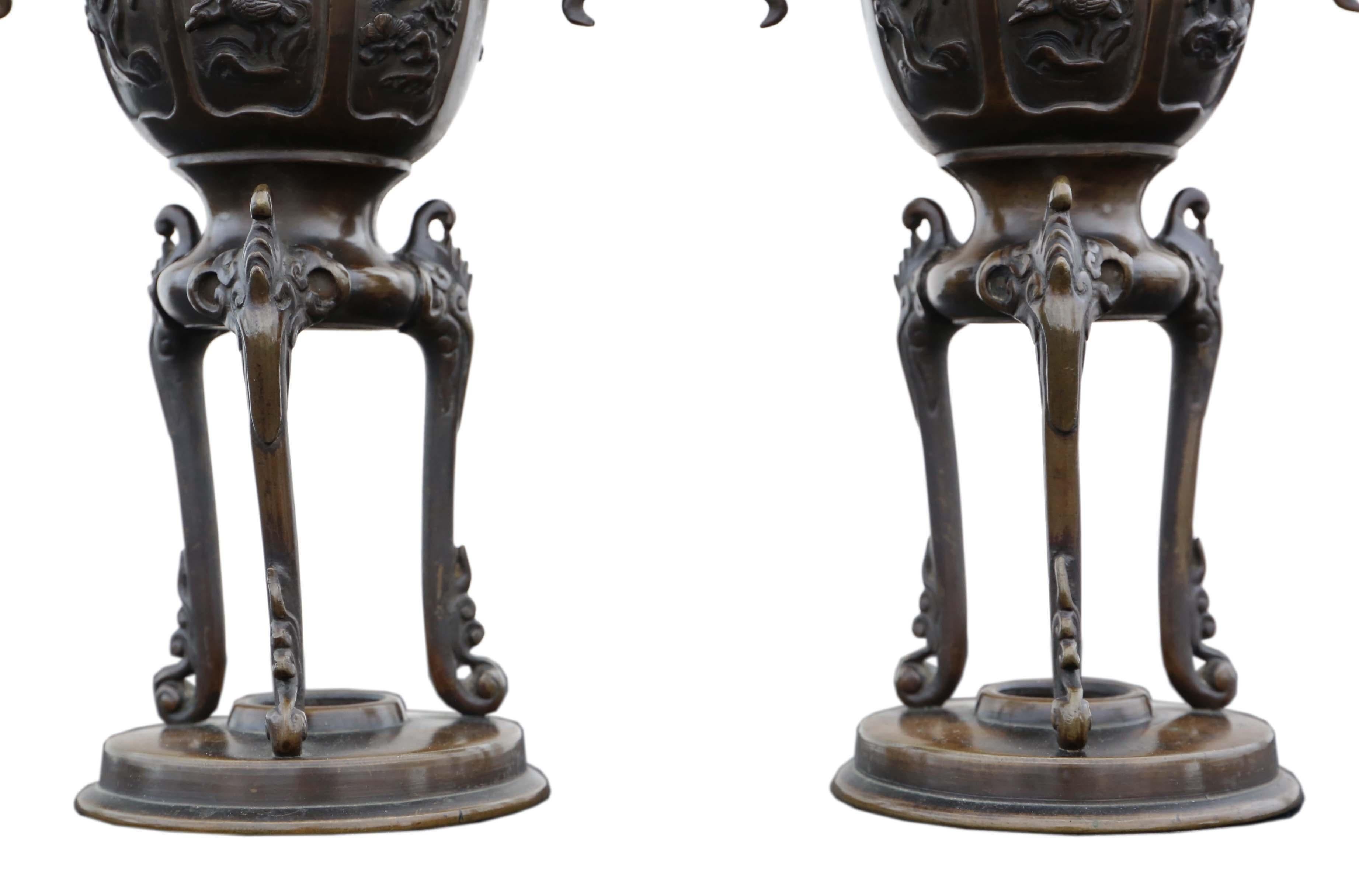 Large quality pair of Chinese bronze vases, 19th century with dragon handles.
Would look amazing in the right location. The very best color and patina.
Overall maximum dimensions: ~32cm high x 14cm diameter across handles. Weigh 1.6Kg each.
In