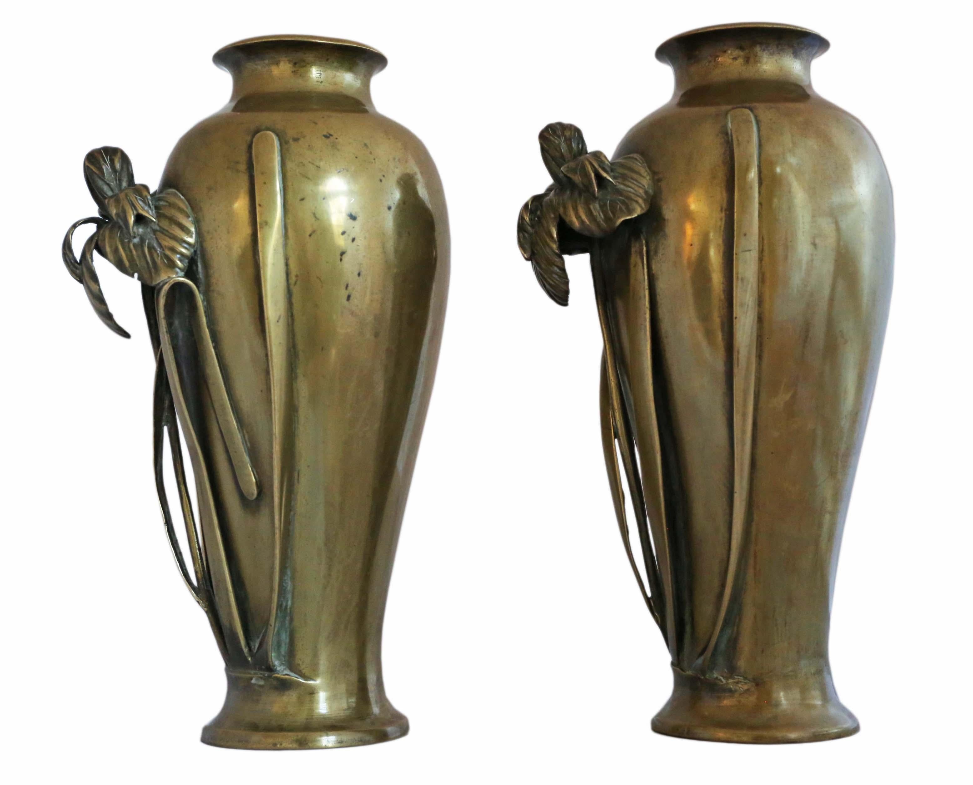 Antique large pair of fine quality Japanese bronze vases Meiji Period C1910. Artist pieces with signature stamp on the bases. Iris relief decoration with a beautiful organic form.

Would look amazing in the right location. Rare large size and