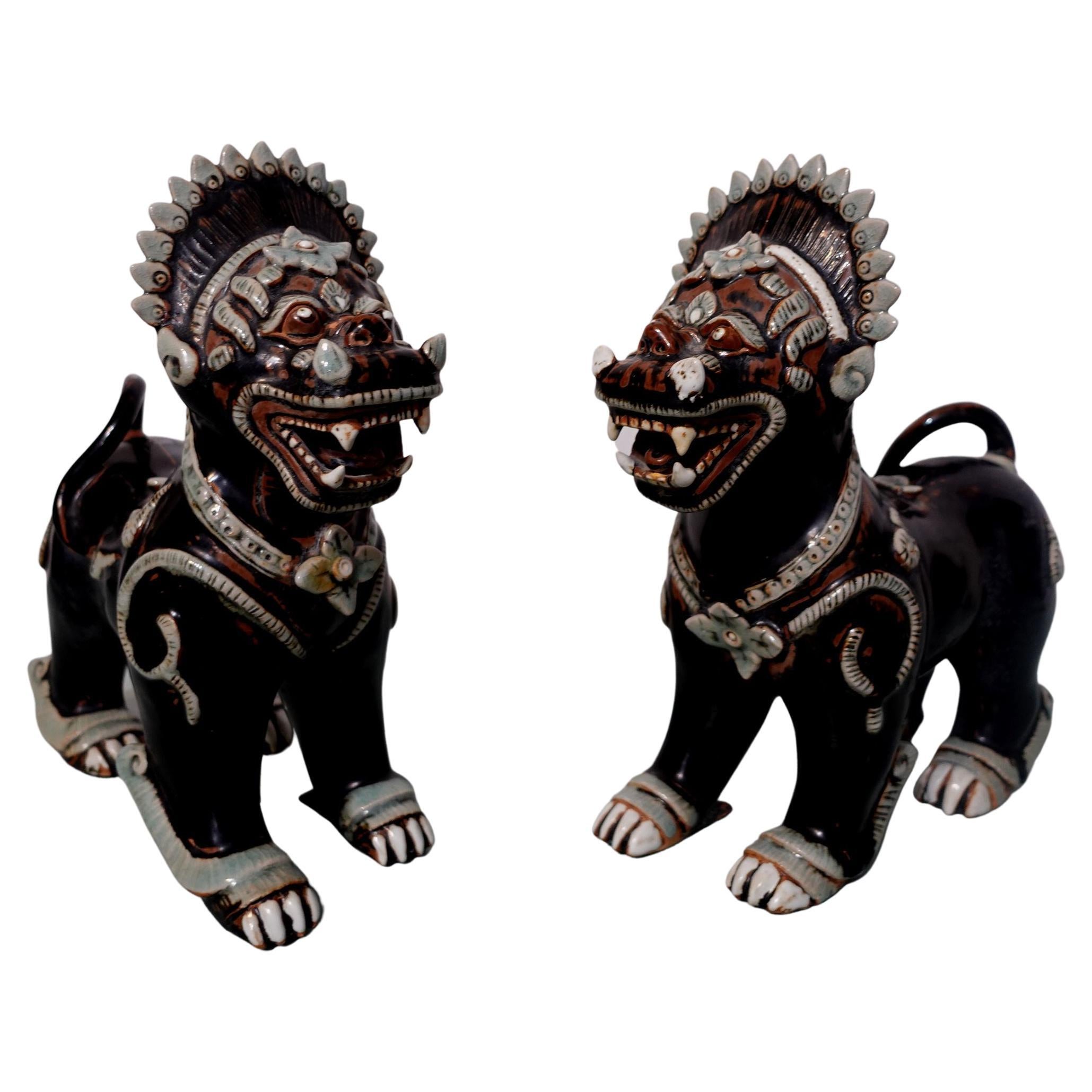 Super quality Antique, Large Pair of Porcelain Noire Glaze Foo Lions/Dogs from the 19th century of China.
Quality work, artistic creation by a high skillful artist. Beautiful and simple colors with a delicate combination of details made this