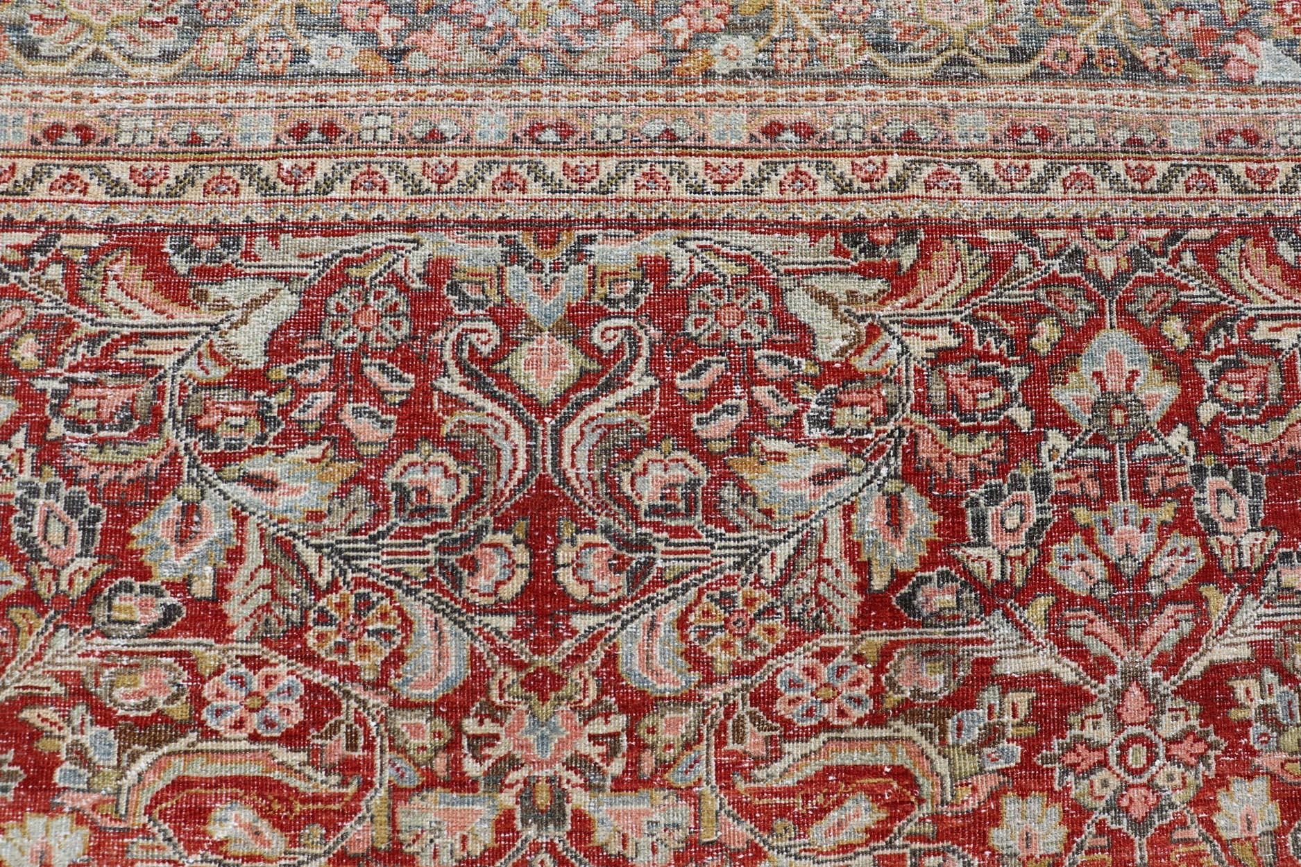 Antique large Persian colorful Sultanabad Mahal rug with all over floral design. Antique Mahal Sultanabad. Keivan Woven Arts; rug W22-0403, country of origin / type: Iran / Mahal, circa 1930.
Measures: 10'10 x 17'8 
This 1930 colorful antique